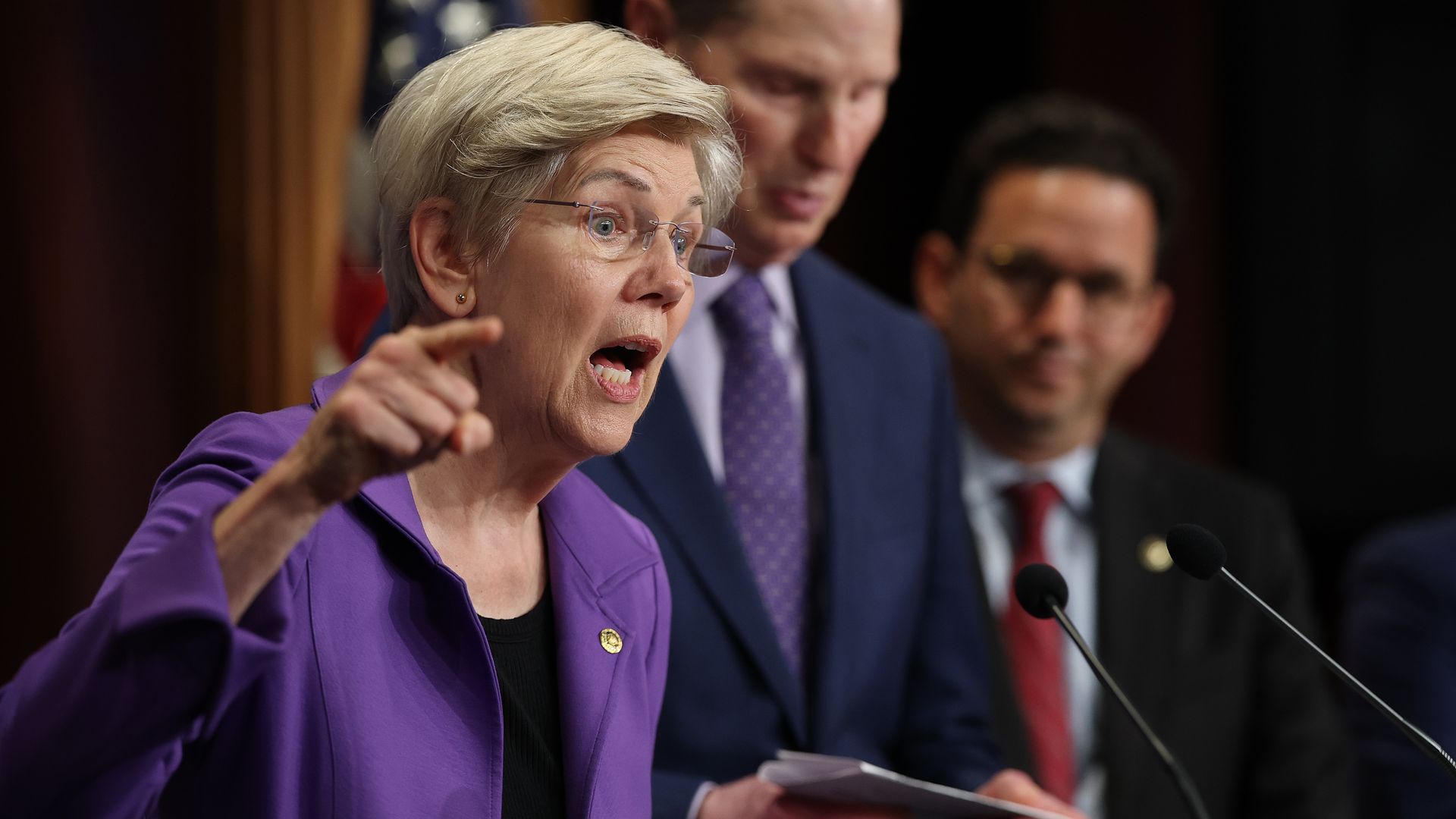 Sen. Elizabeth Warren (L) (D-MA) speaks during a press conference with Senate Democrats on Social Security at the U.S. Capitol on April 01, 2025 in Washington, DC.