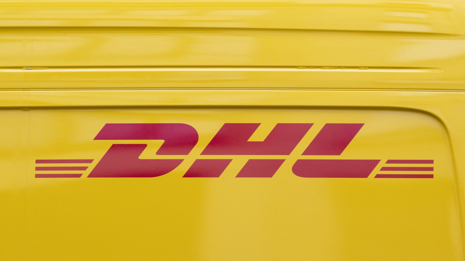 Close-up of the red DHL logo