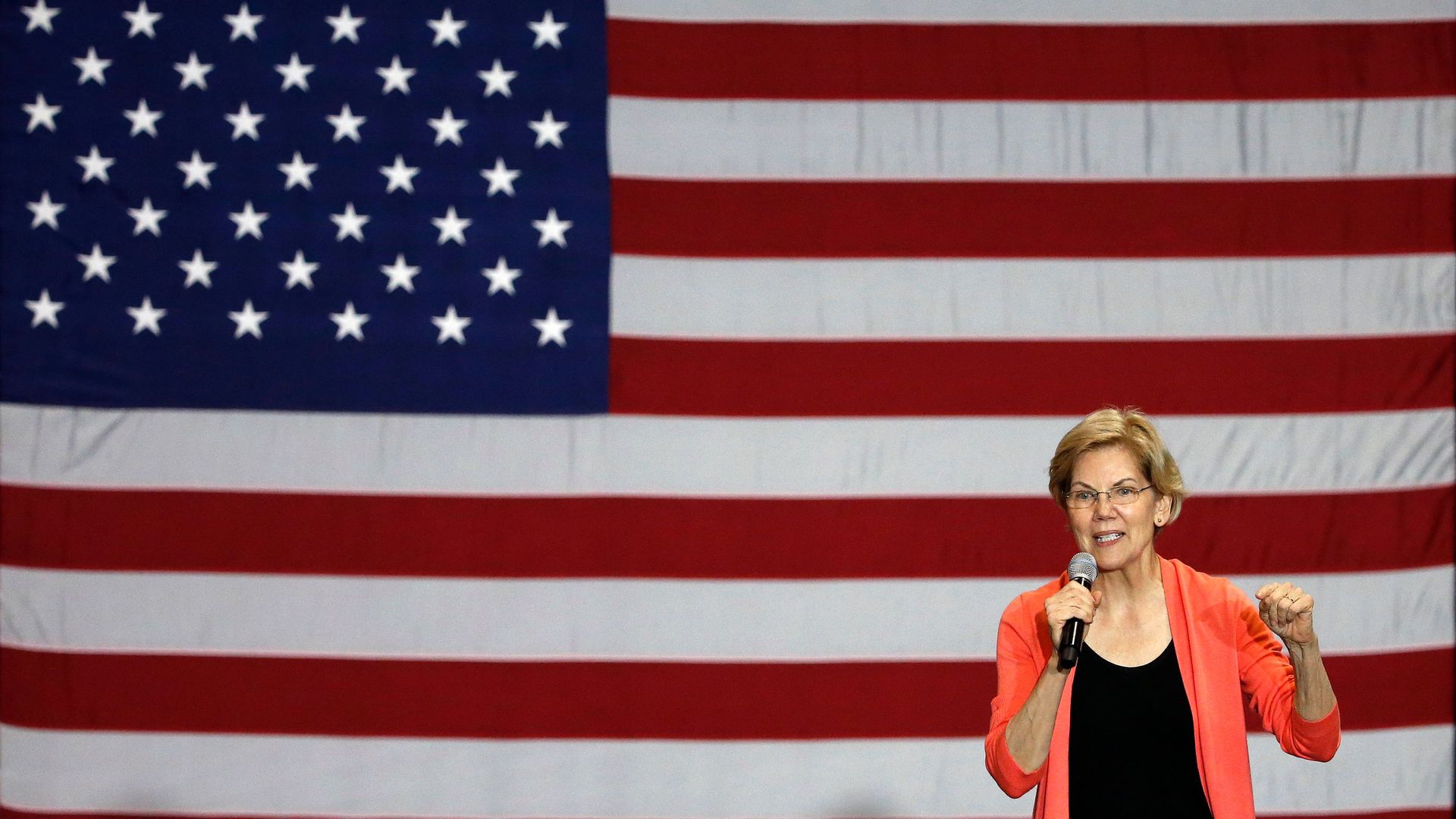 Senator of Massachusetts (D) and Democratic Presidential hopeful Elizabeth Warren gestures as she speaks during a town hall meeting at Florida International University in Miami, Florida on June 25.