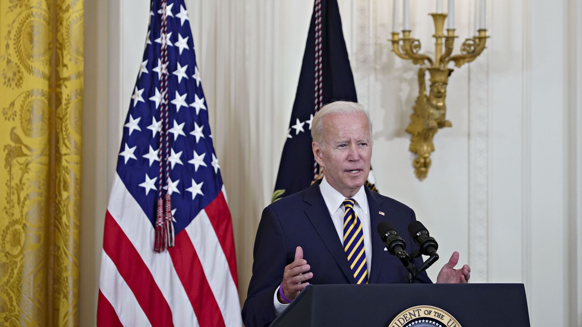 President Joe Biden speaks before signing the PACT Act.