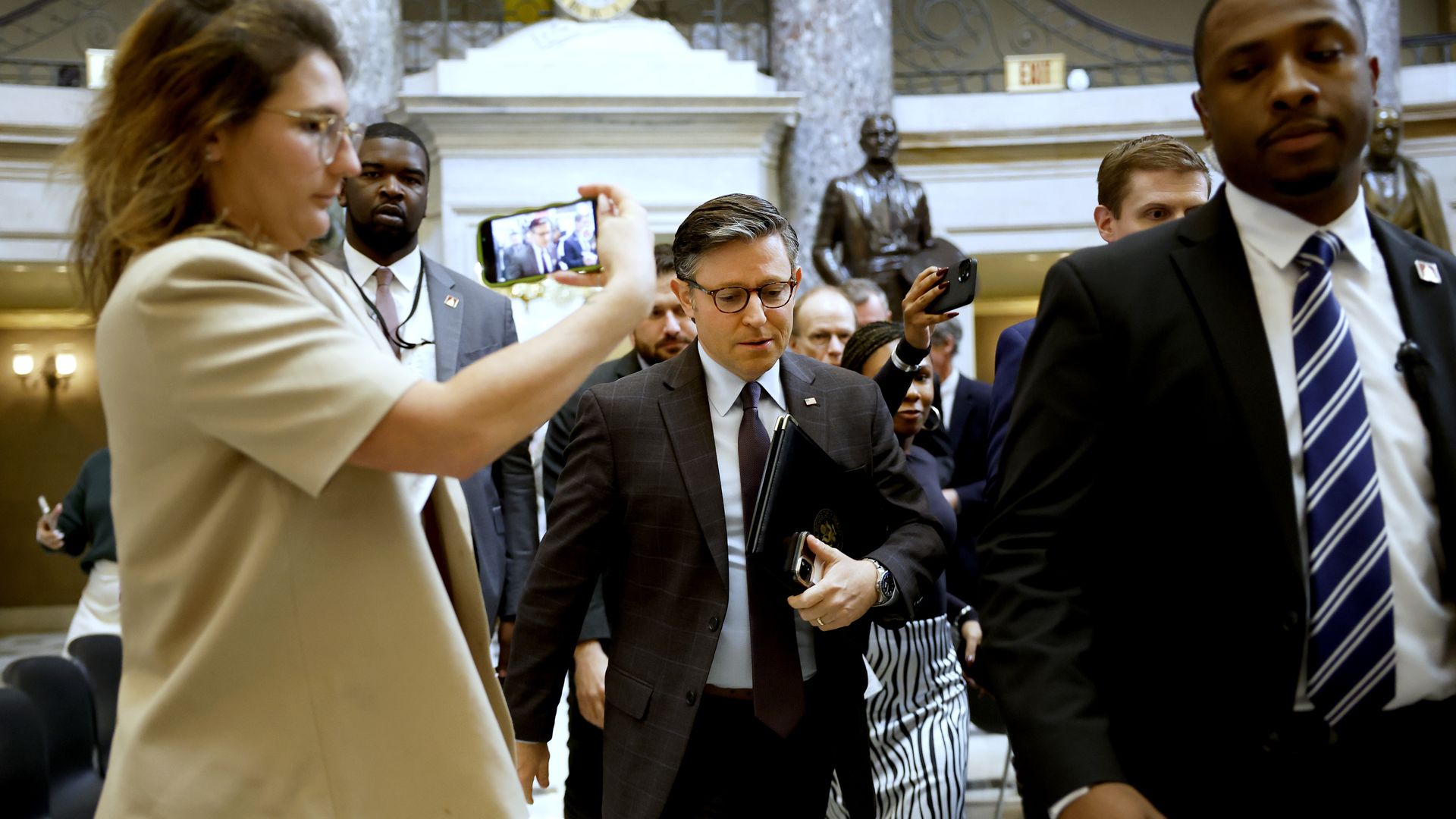WASHINGTON, DC - SEPTEMBER 19: U.S. Speaker of the House Mike Johnson (R-LA) is followed by reporters as he walks to the House Chambers on September 19, 2024 in Washington, DC. Johnson continues to negotiate with house republicans and democrats to reach an agreement on funding legislation to avoid a