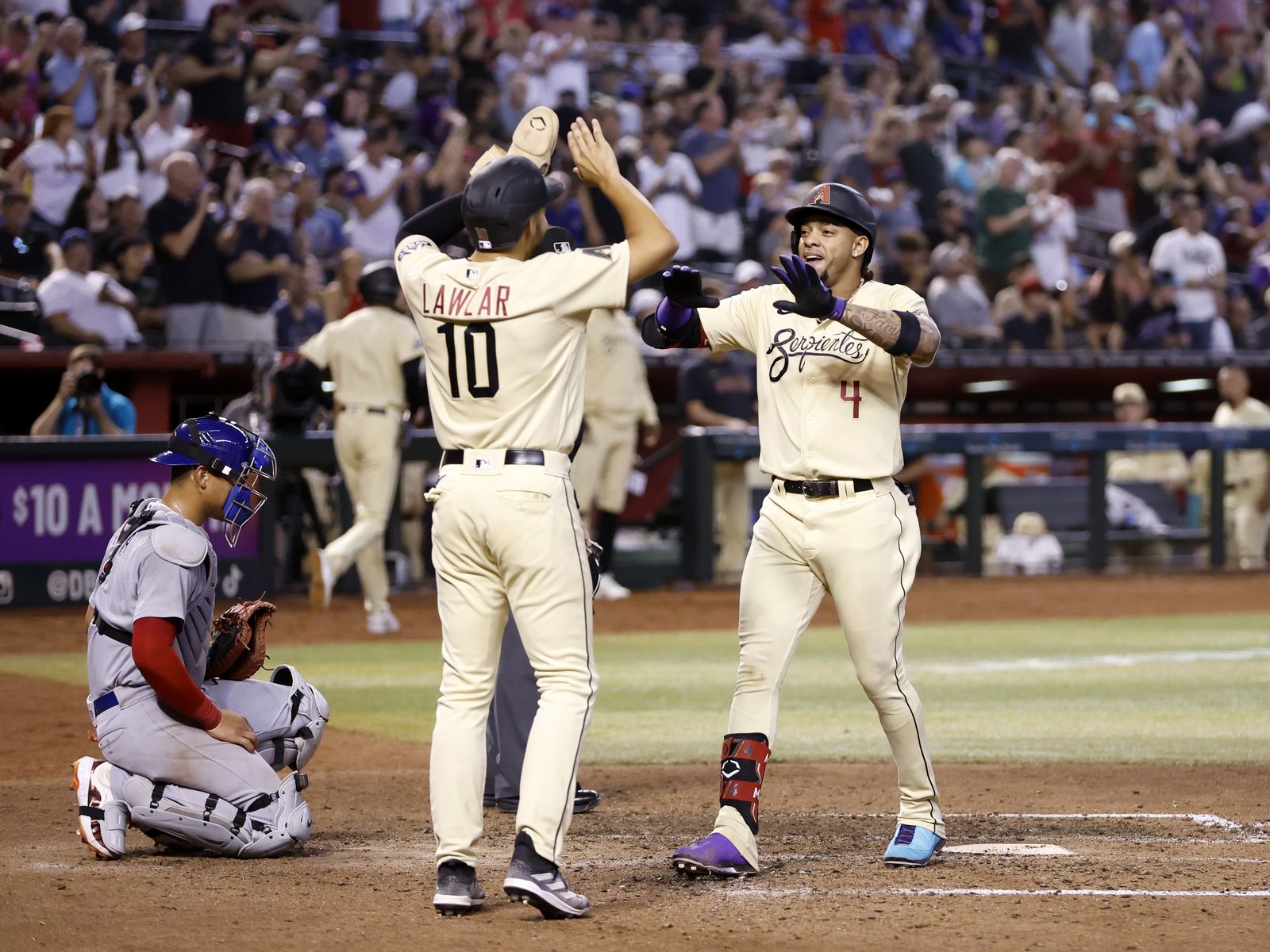 Download Celebrating a Home Run with the Atlanta Braves Wallpaper