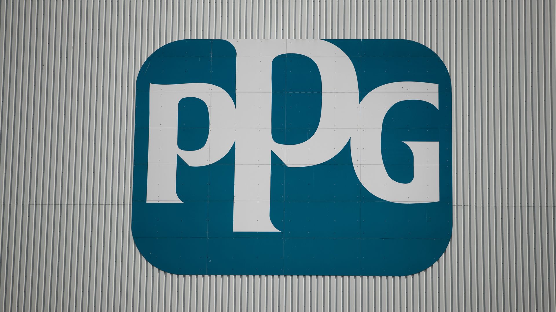 The PPG Industries Inc. logo sits on the exterior of the PPG paints and coatings factory in Amsterdam, Netherlands, on Tuesday, Aug. 1, 2017.
