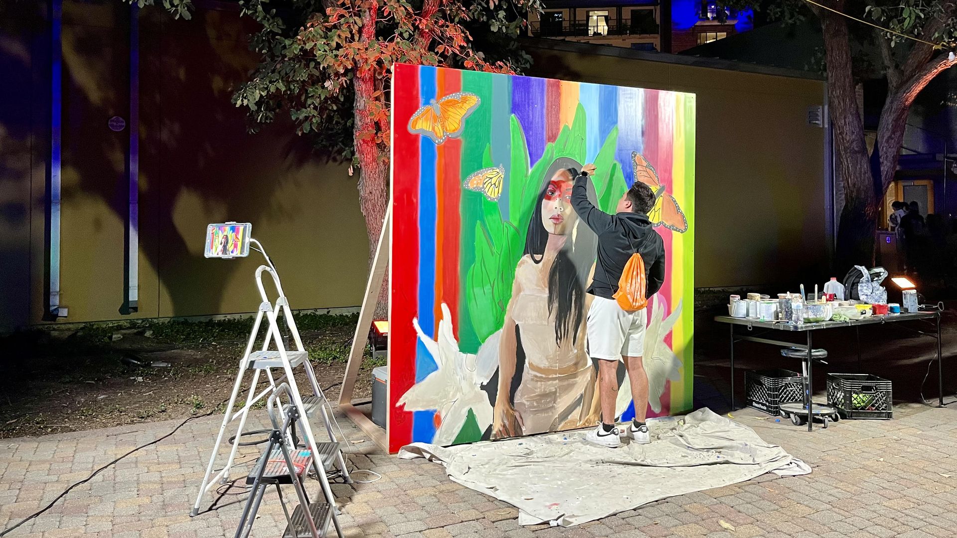 A live painting at nighttime.