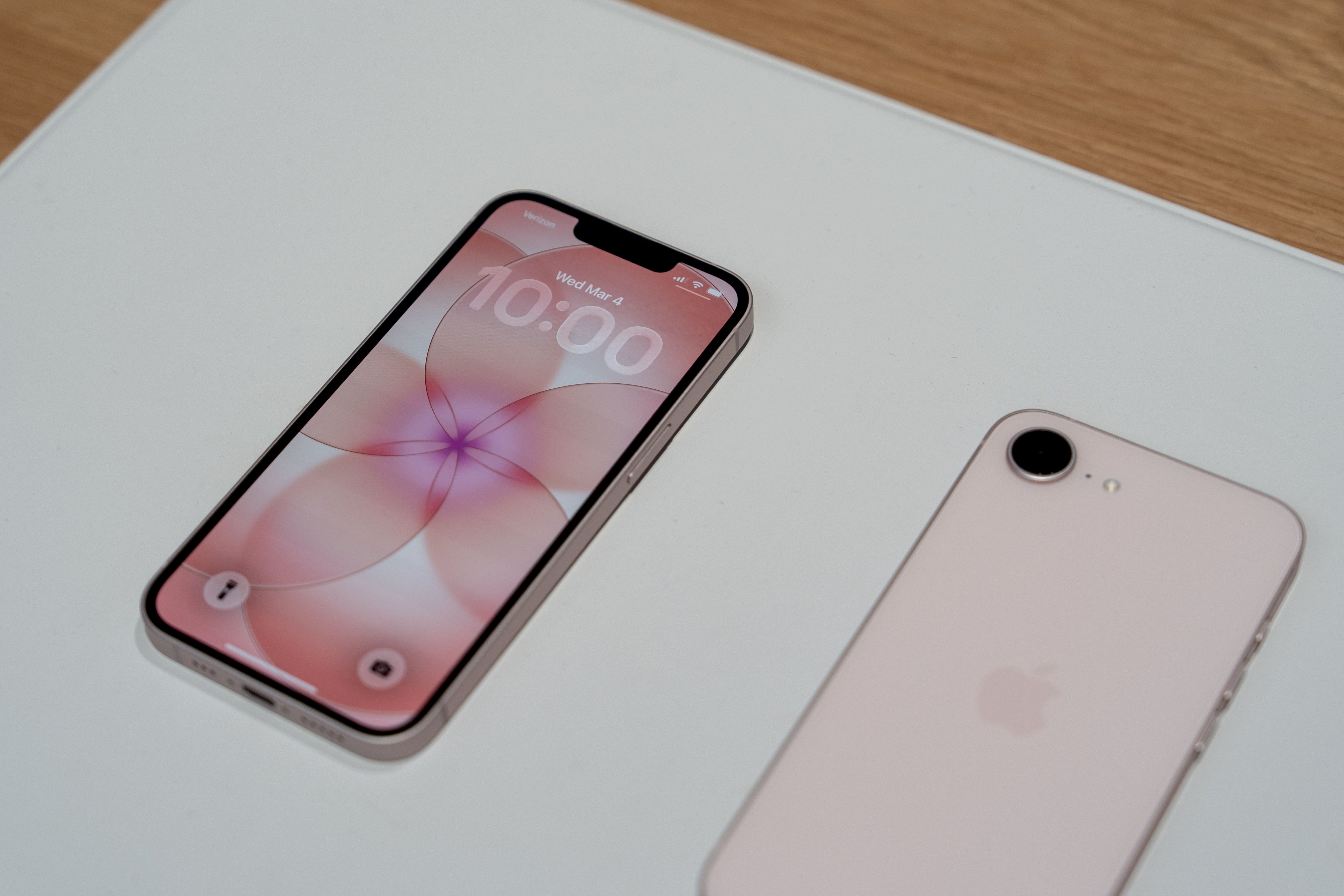 A soft pink Apple iPhone 17e on display at an Apple event in New York on March 4, 2026.