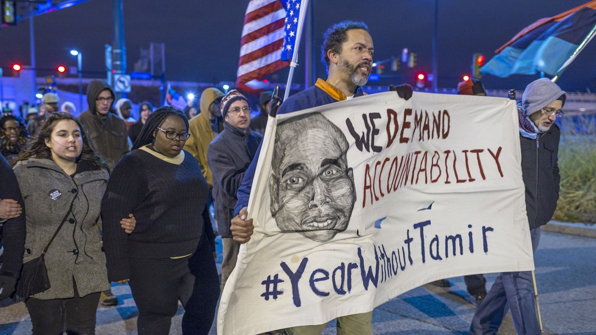 Demonstrators march on Ontario St. on December 29, 2015 in Cleveland, Ohio.