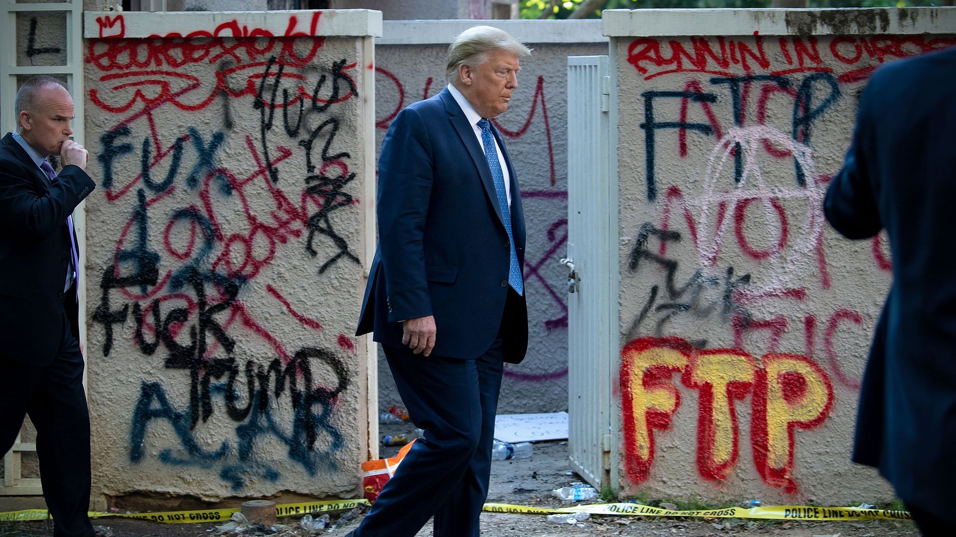 US President Donald Trump walks back to the White House escorted by the Secret Service after appearing outside of St John's Episcopal church across Lafayette Park in Washington, DC on June 1, 2020