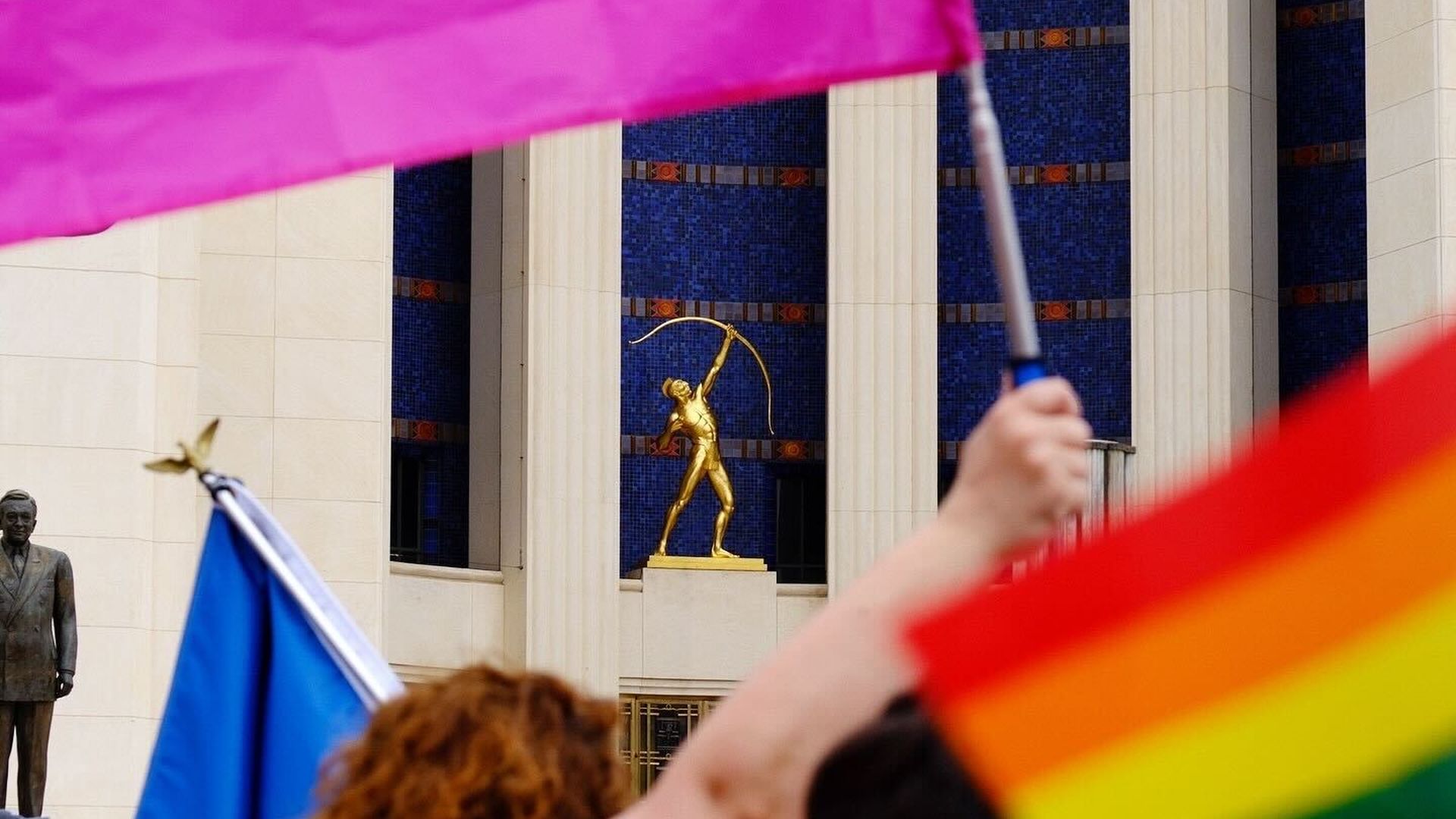 Pride flags at a parade in Dallas