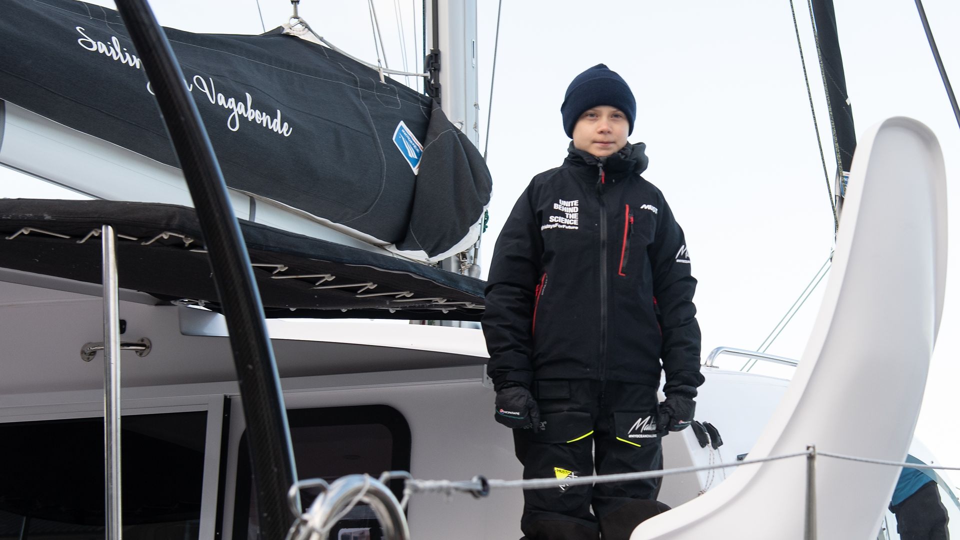 Swedish climate activist Greta Thunberg stands aboard the catamaran La Vagabonde