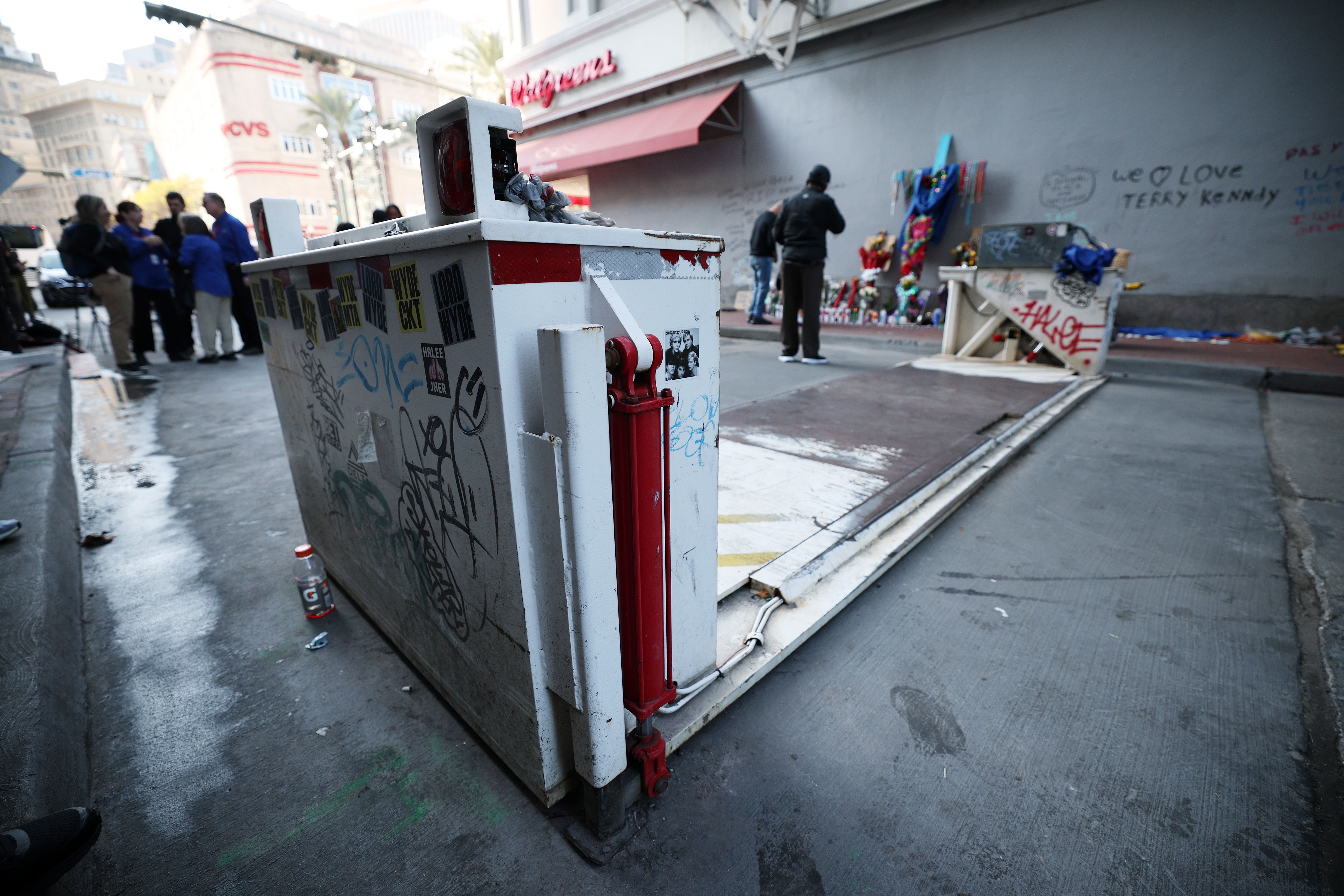 Photo shows a vehicle barrier on Bourbon Street.