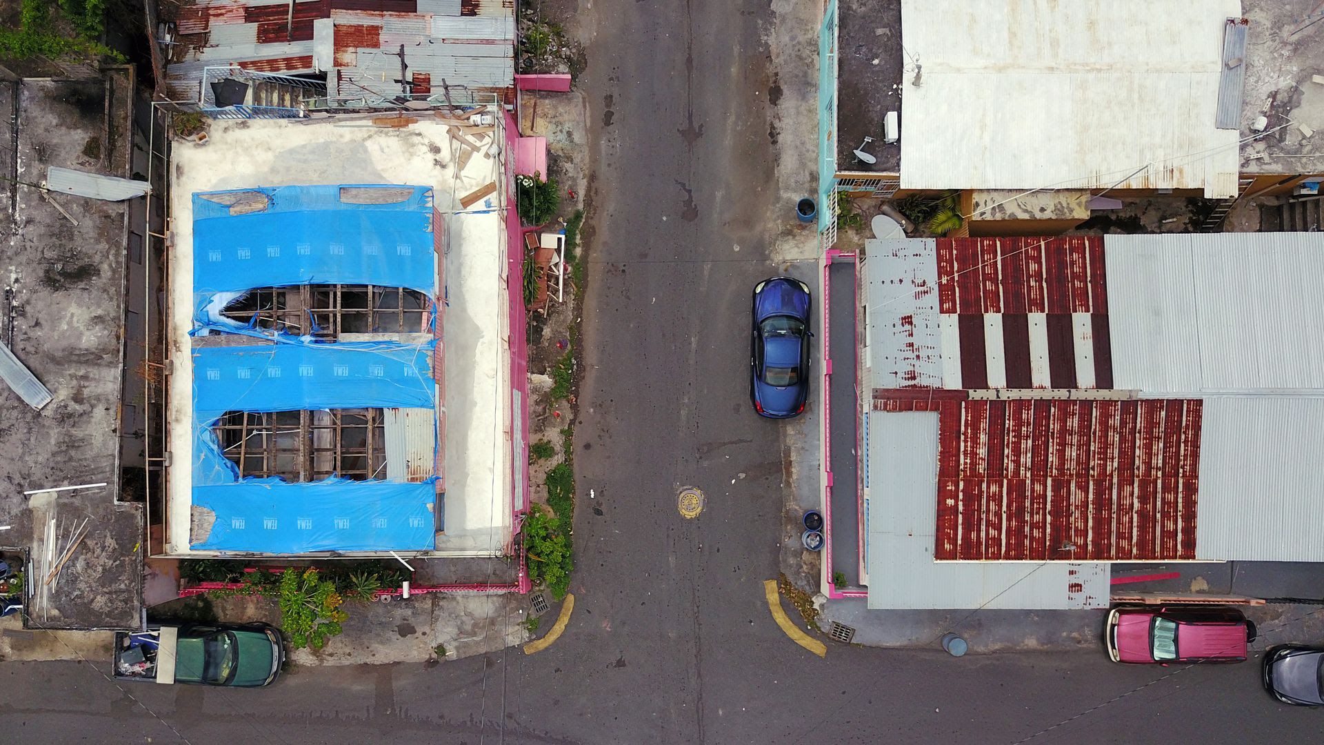 A roof in San Juan, Puerto Rico, still shows damage from Hurricane Maria two years ago