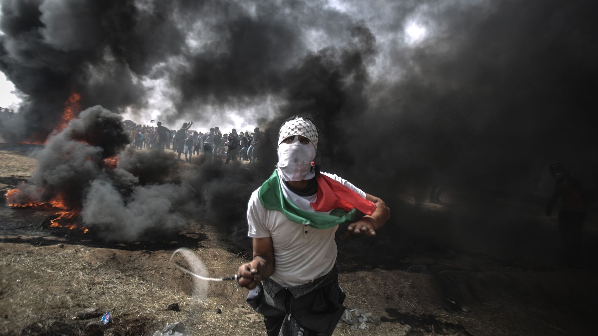 A Palestinian protester at the Gaza-Israel border