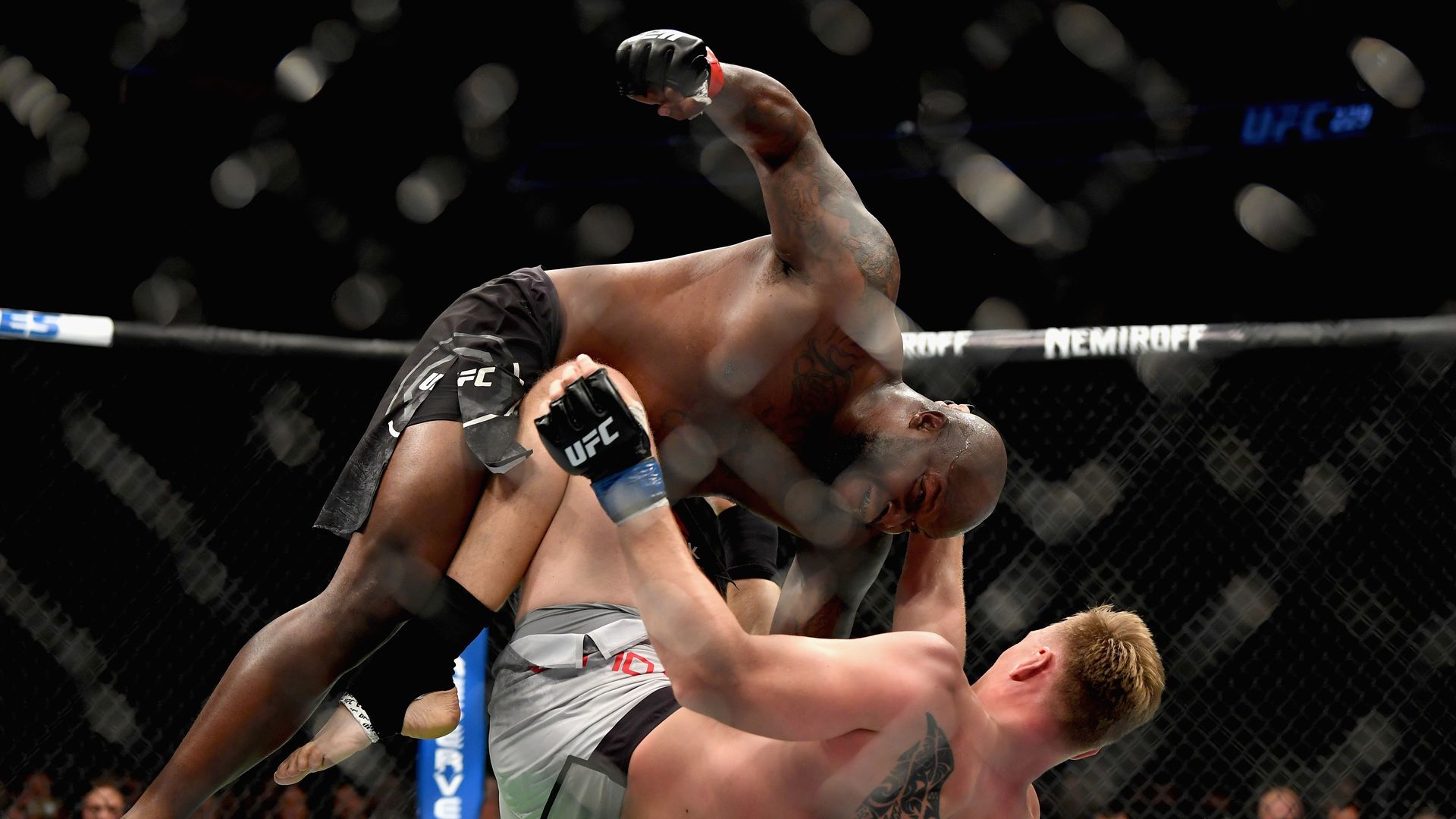 UFC fighter Derrick Lewis beats on Alexander Volkov of Russia