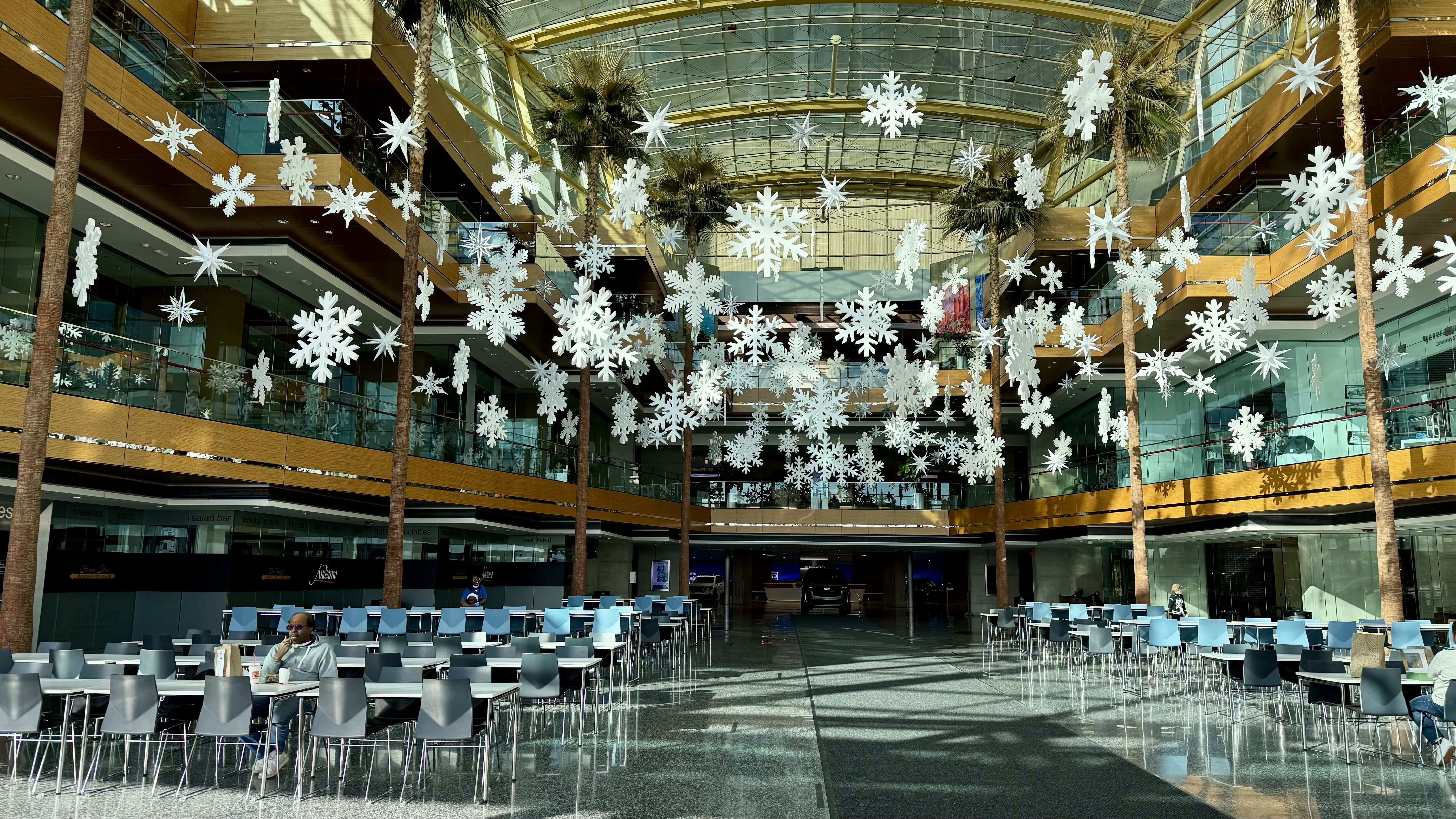 The Wintergarden has tons of light flooding in, with snowflake decorations brightening the space.