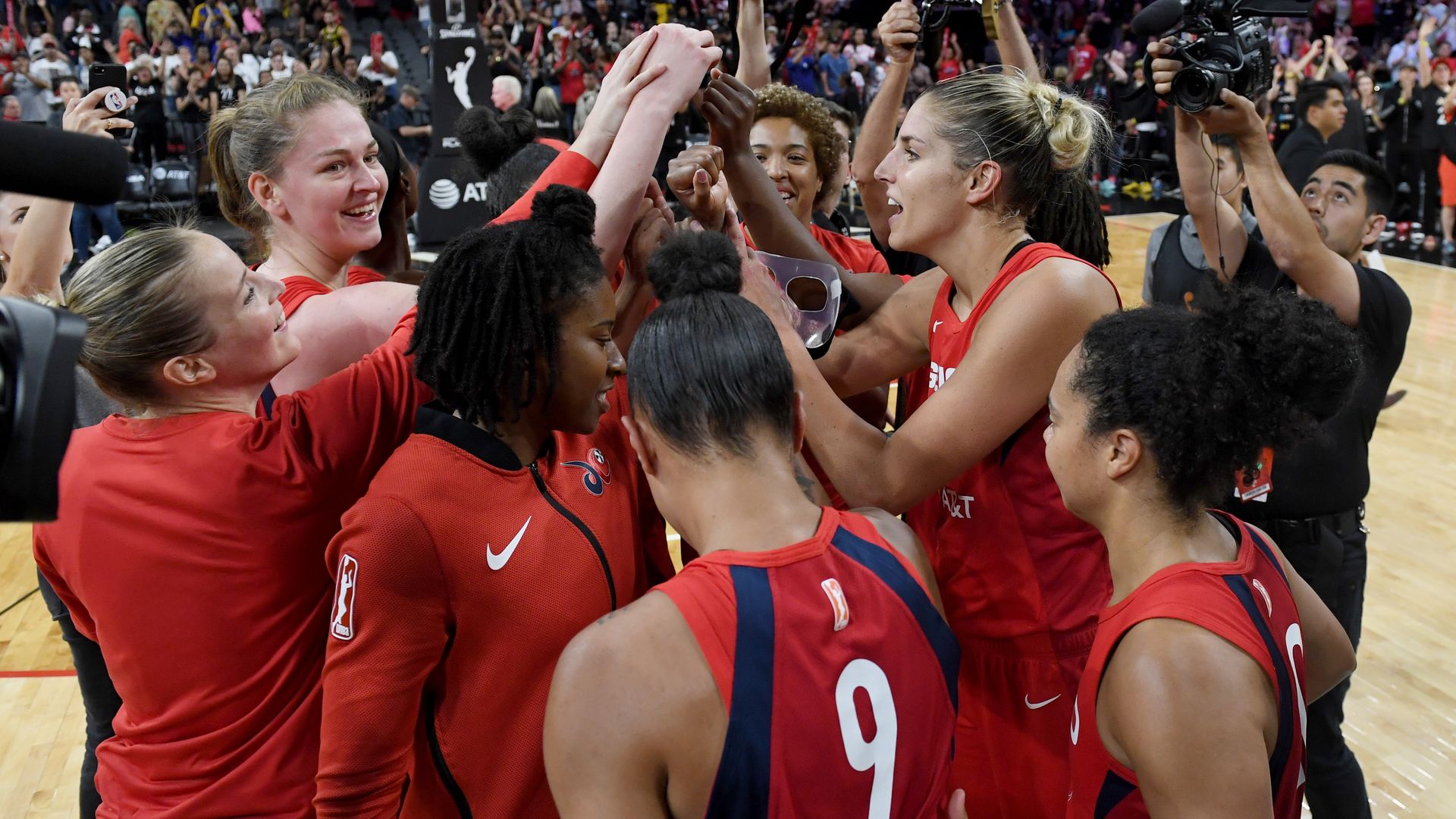 Mystics players celebrate the win