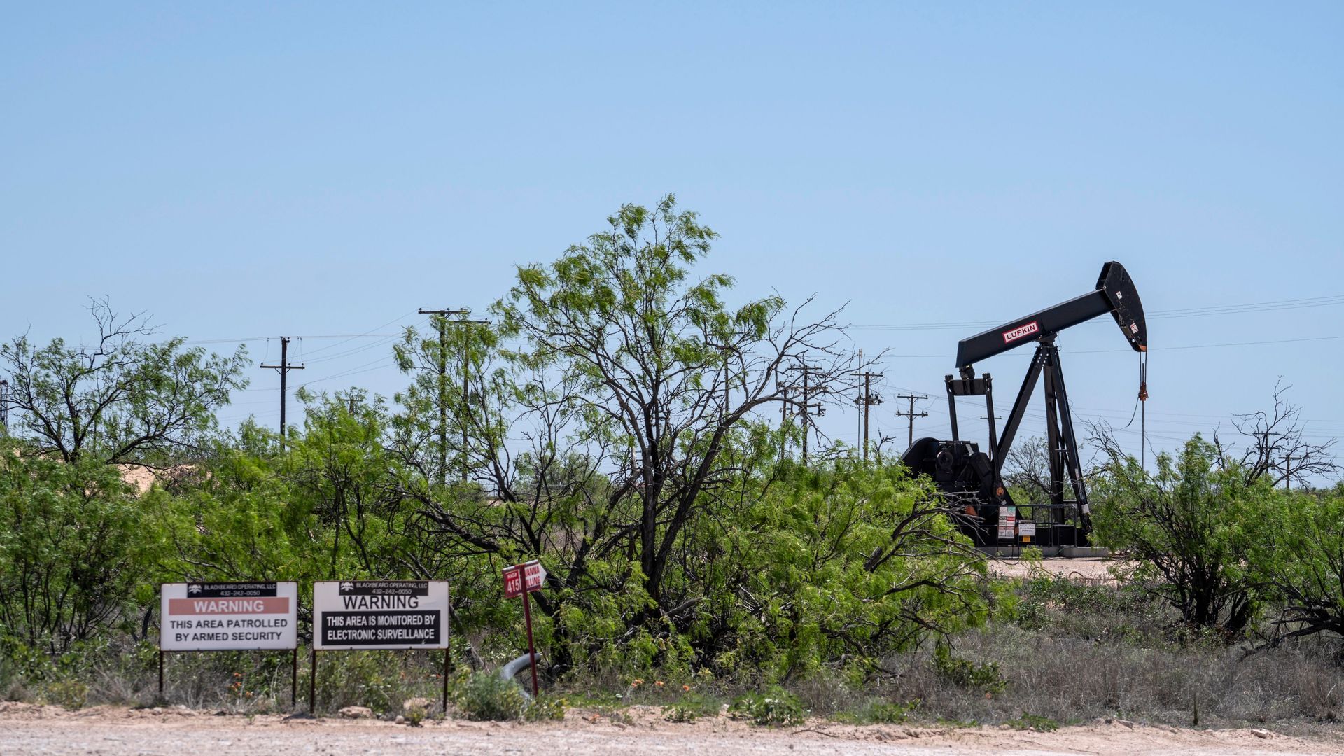 A pump jack operates in the Permian Basin near Odessa, Texas