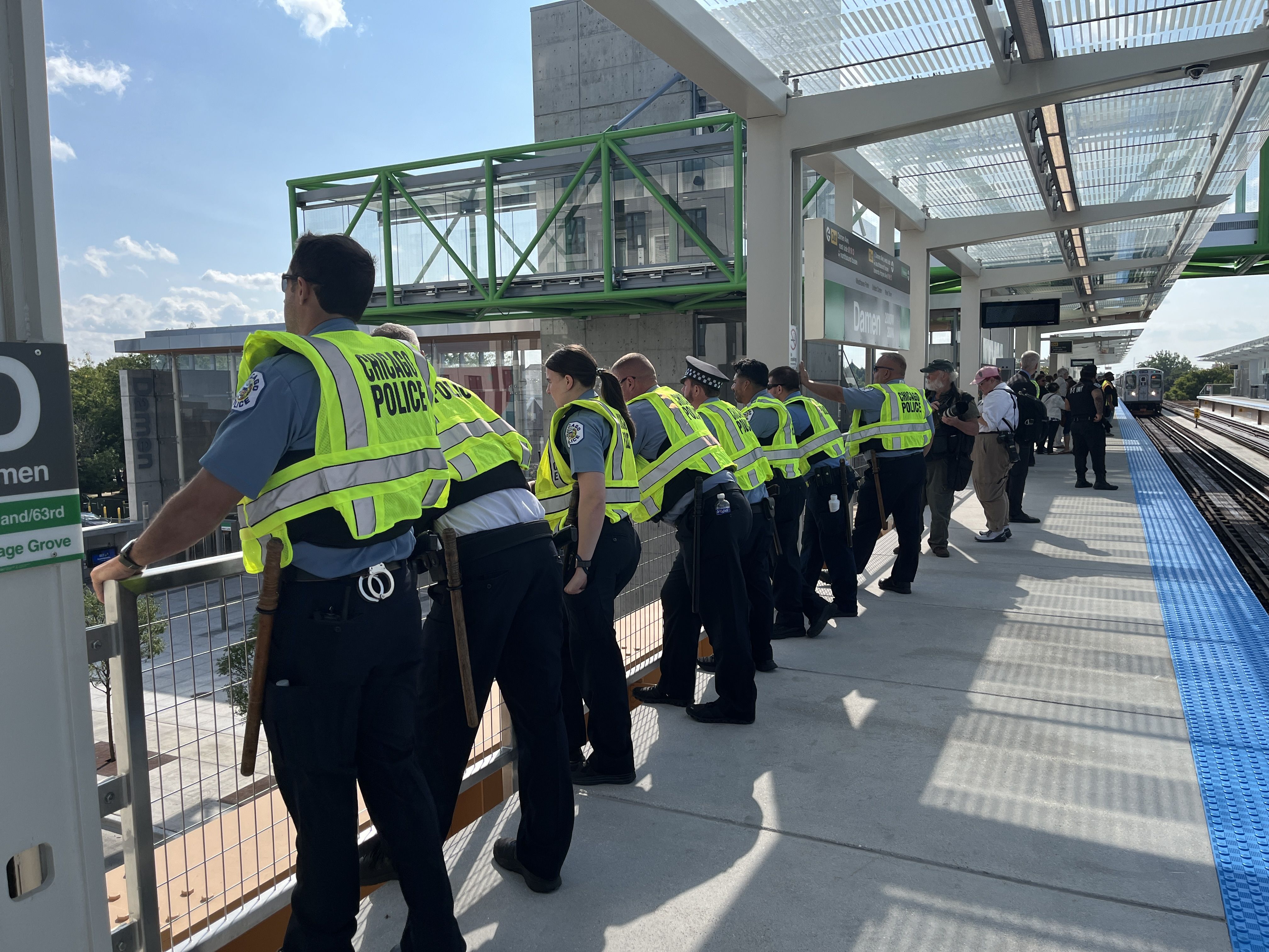 police watch protest from CTA platform