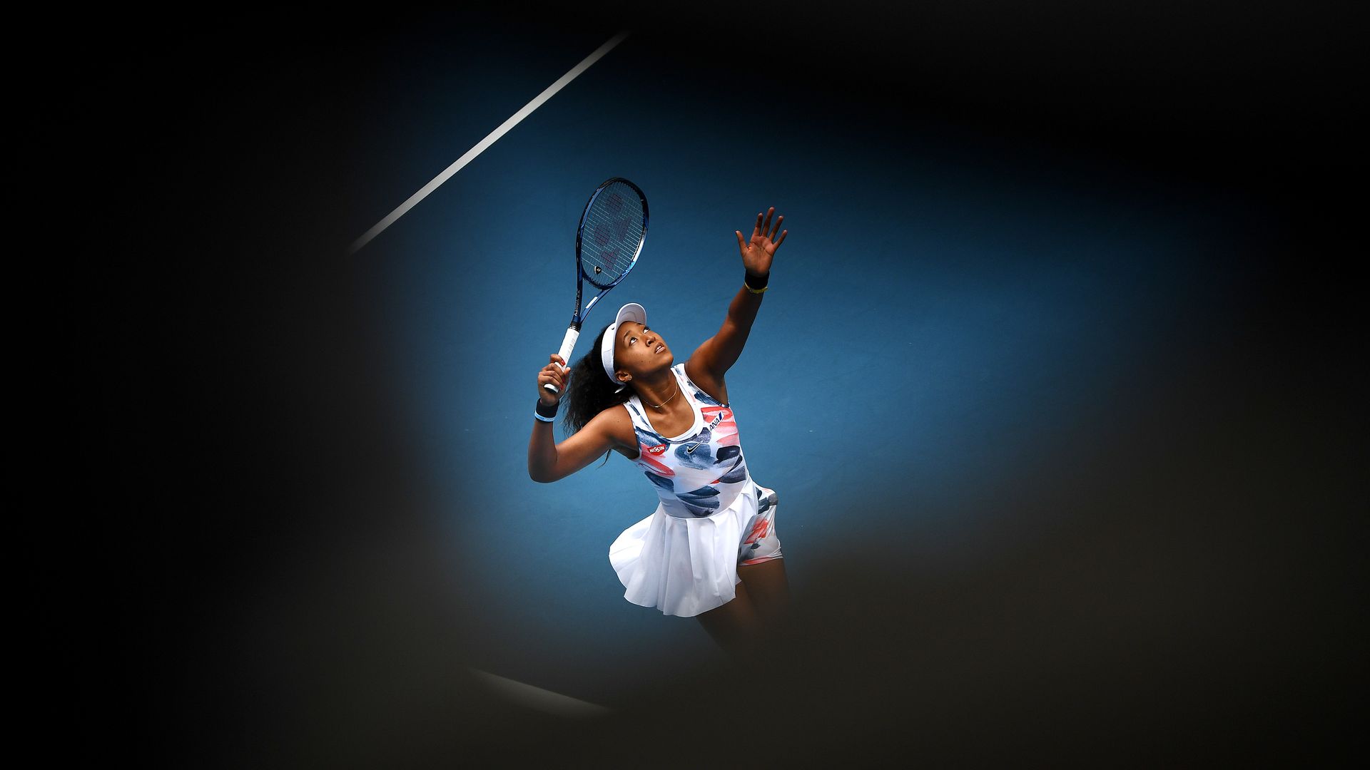 Naomi Osaka of Japan serves during her Women's Singles second round match against Saisai Zheng of China in January 2020.