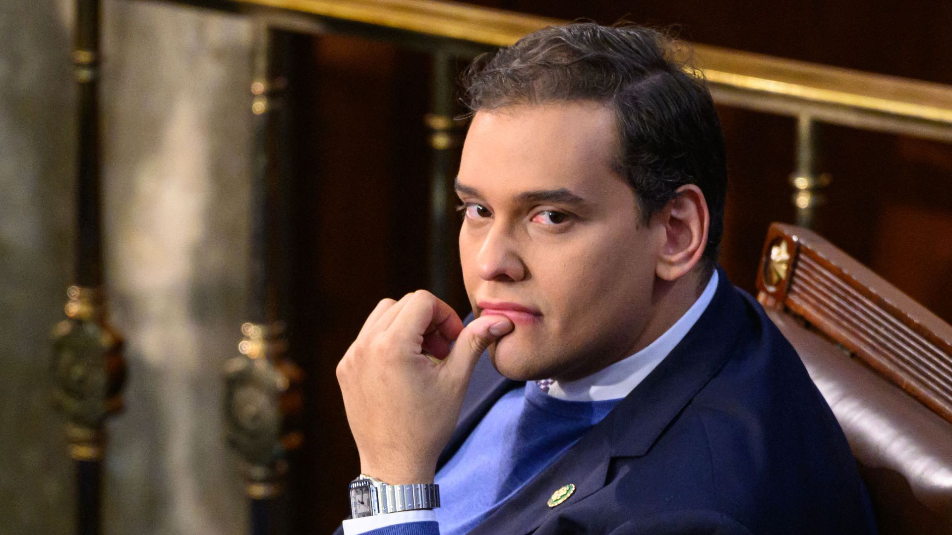 Representative from New York, George Santos looks on as the US House of Representatives convenes for the 118th Congress at the US Capitol January 3.