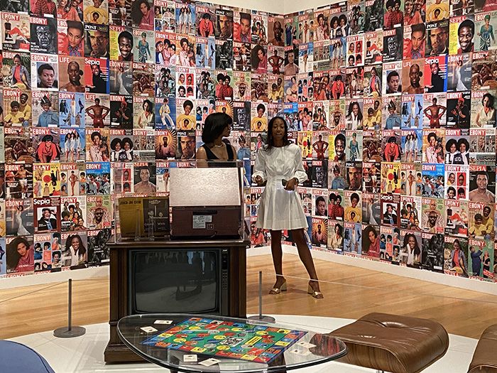 Collector Cheryse Terry (left) and curator Jessica Gaynelle Moss in Terry's section of "The Vault." Photo: Ashley Mahoney/Axios