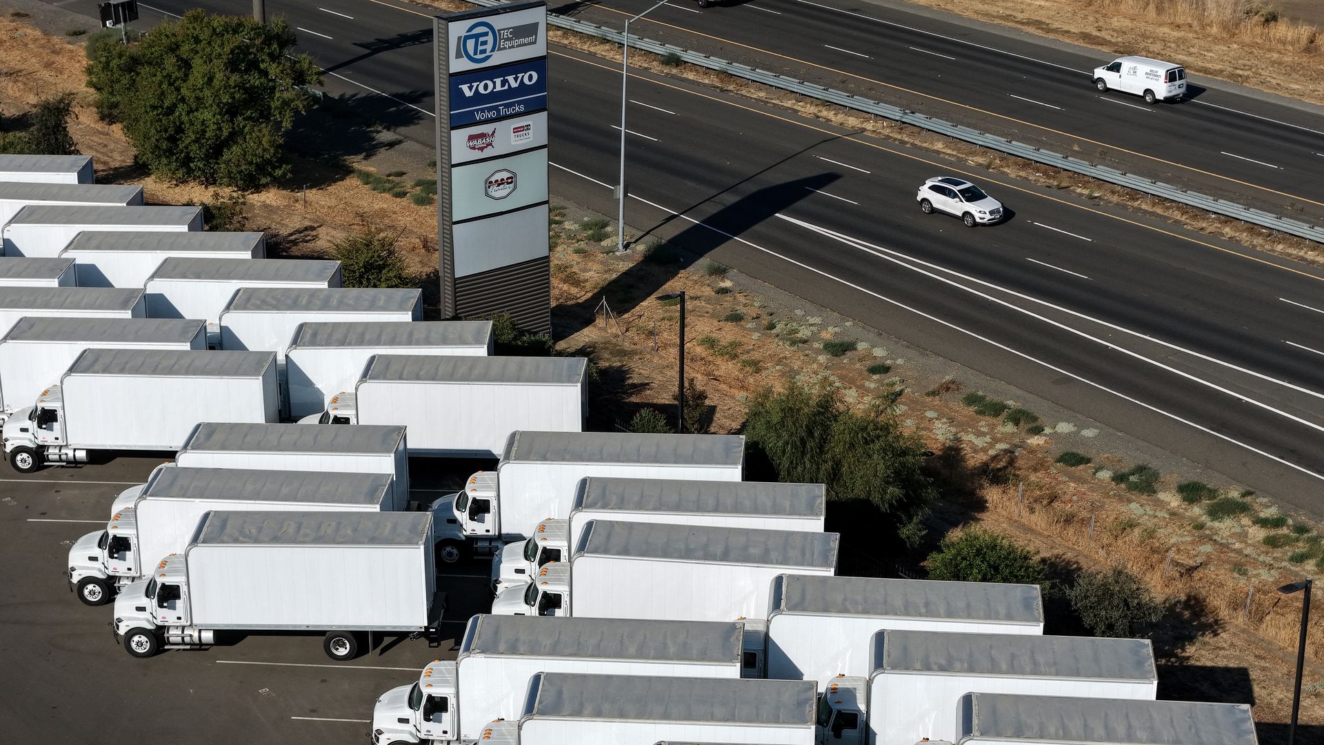  In an aerial view, brand new trucks are displayed at TEC Equipment on September 26, 2025 in Dixon, California 