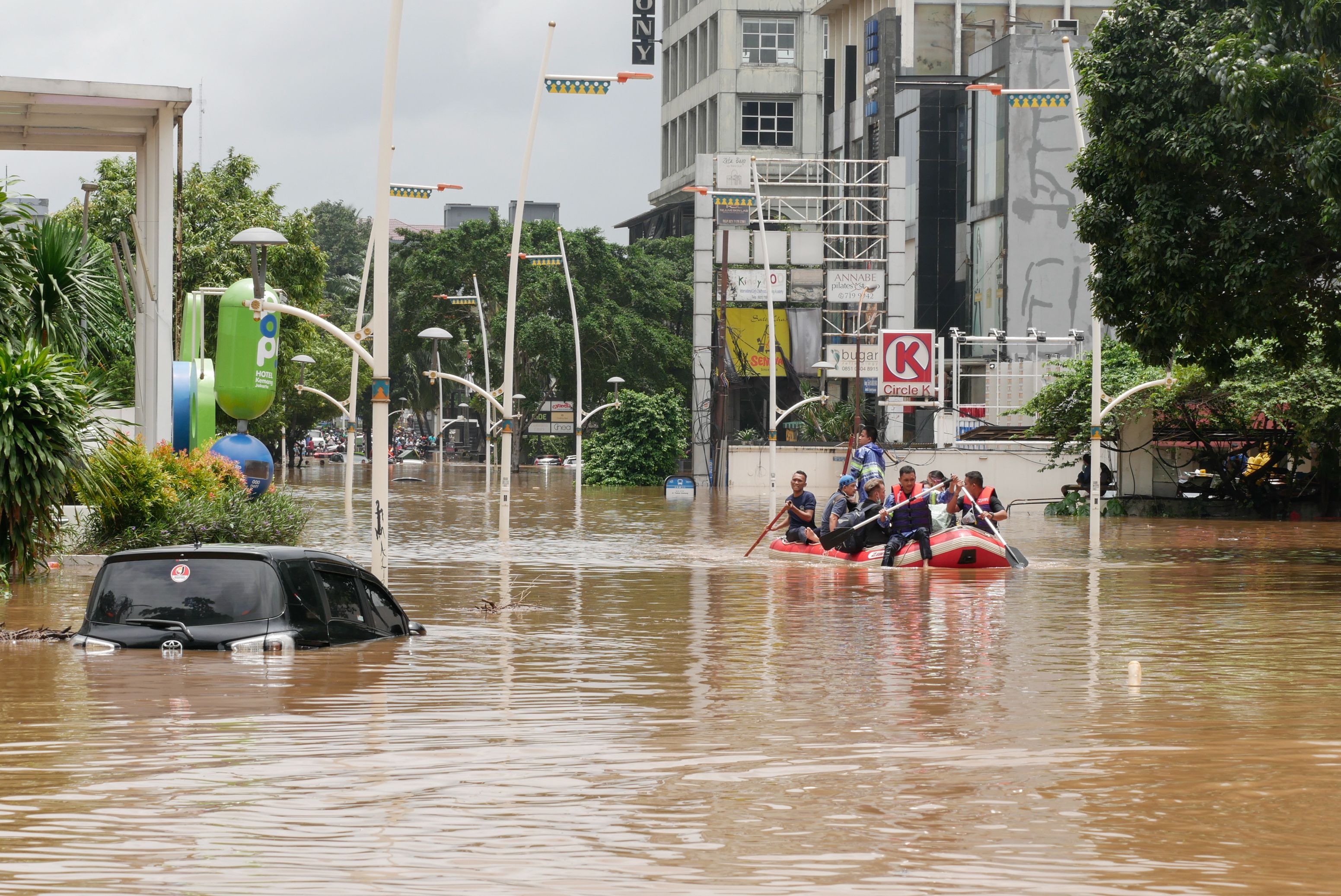 Residents evacuated during a flood following heavy rains at Kemang in Jakarta, Indonesia on February 20, 2021. 
