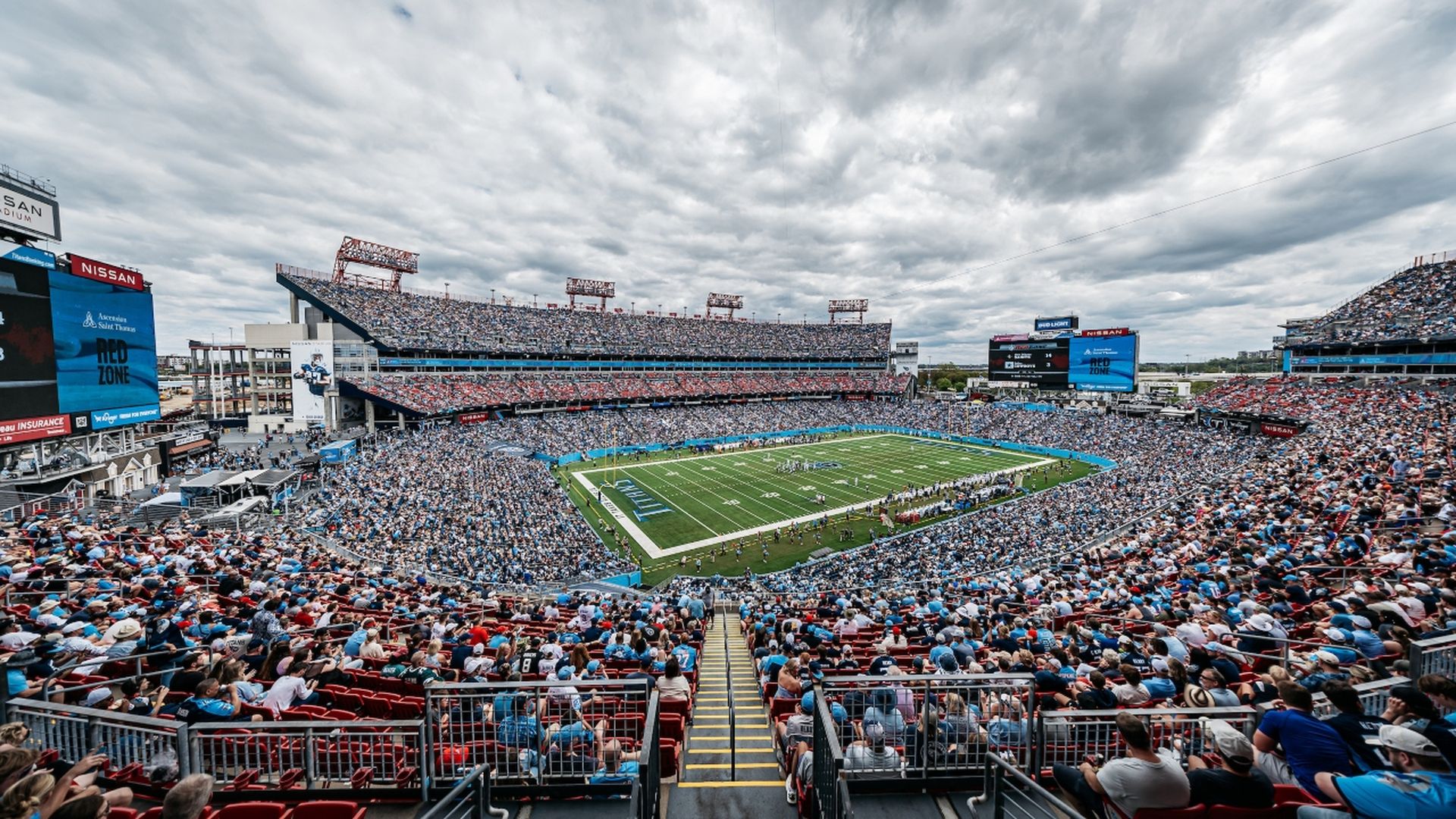 A packed Nissan Stadium captures the energy of game day as fans watch