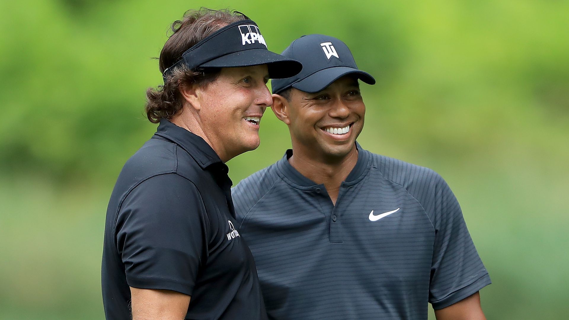 Mickelson and Woods during the 2018 WGC-Bridgestone Invitational at Firestone Country Club in Akron, Ohio.