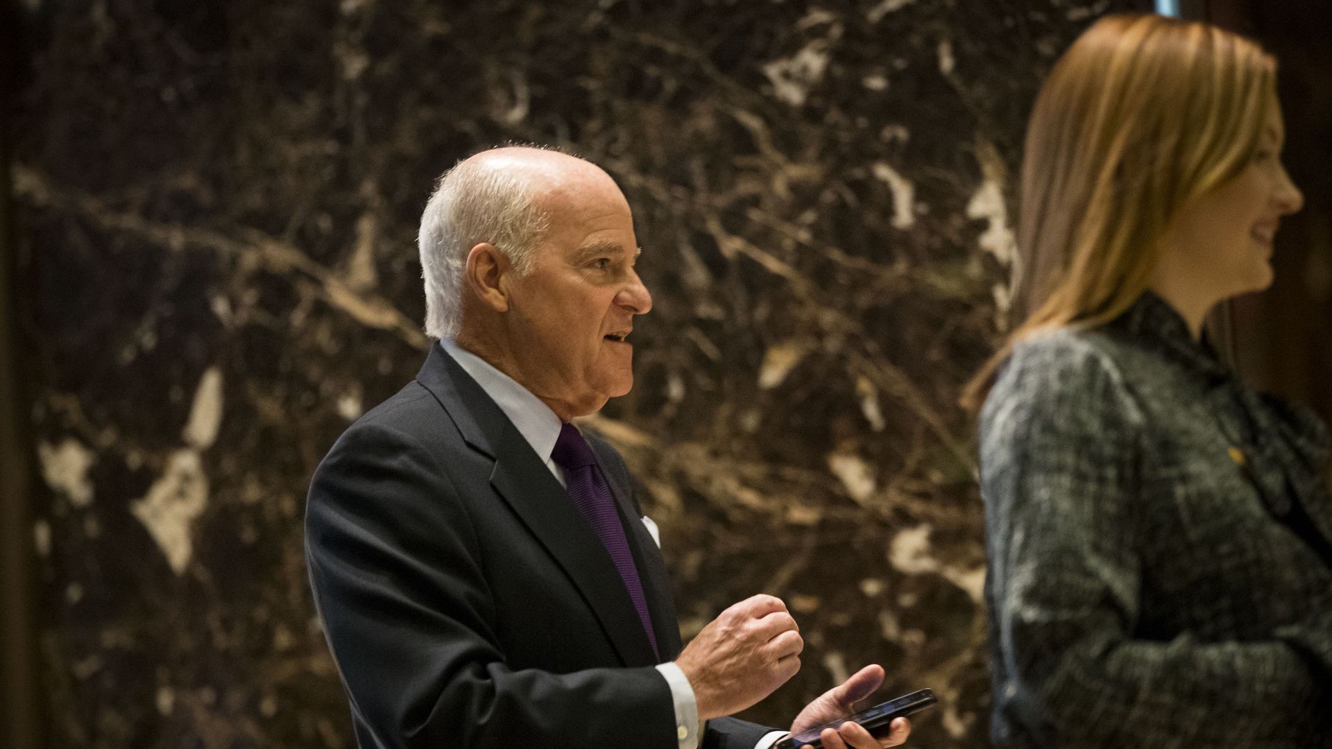 KKR co-founder Henry Kravis enters Trump Tower.