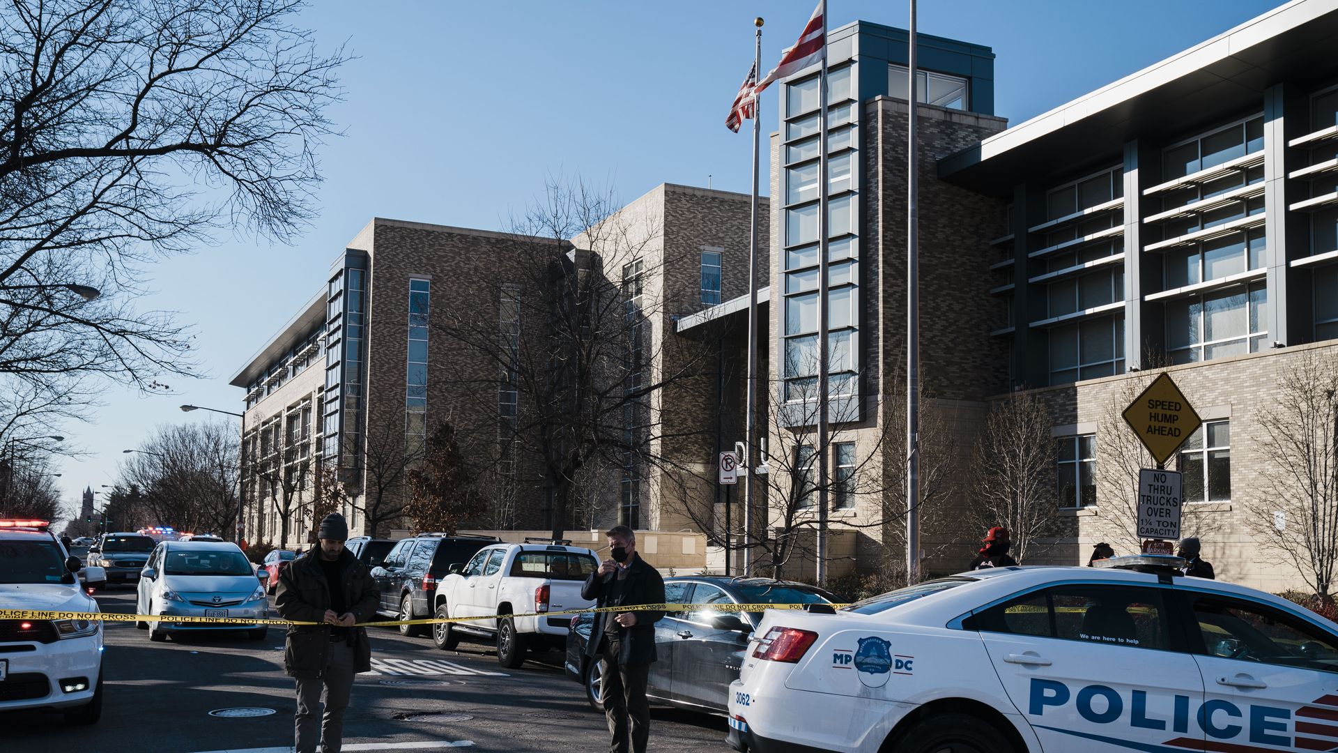 Law Enforcement shut down the street fronting Dunbar High School as students are evacuated after a bomb threat was called into the school on Tuesday, Feb. 8, 2022 in Washington, DC. 