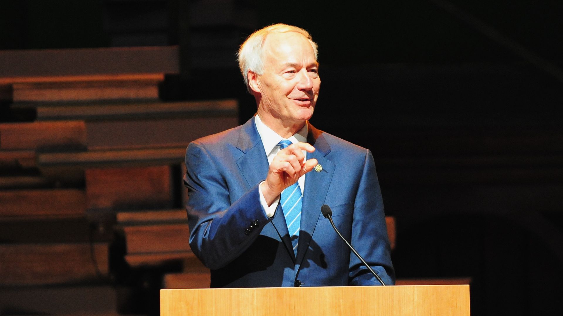 A photo of Republican Asa Hutchinson, former governor of Arkansas, speaking from a podium.