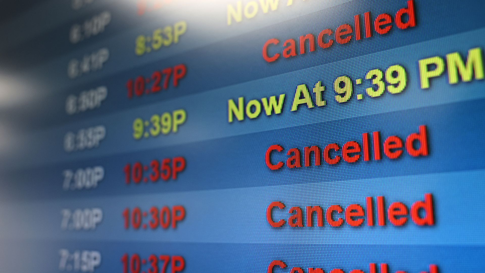An arrivals board shows delayed and cancelled flights at Hollywood Burbank Airport on October 6, 2025 in Burbank, California.
