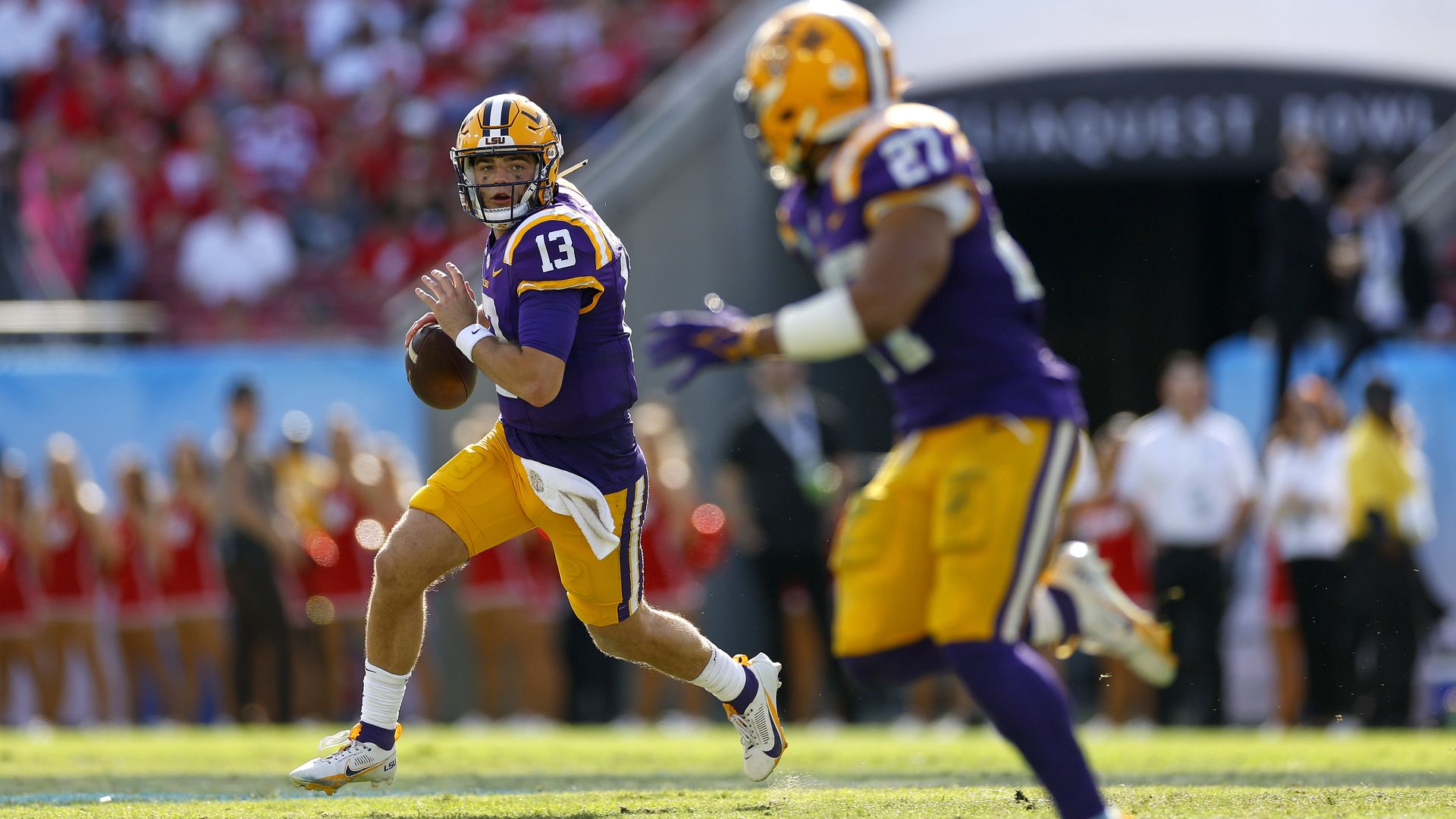 A photo of Garrett Nussmeier dropping back before making a pass.