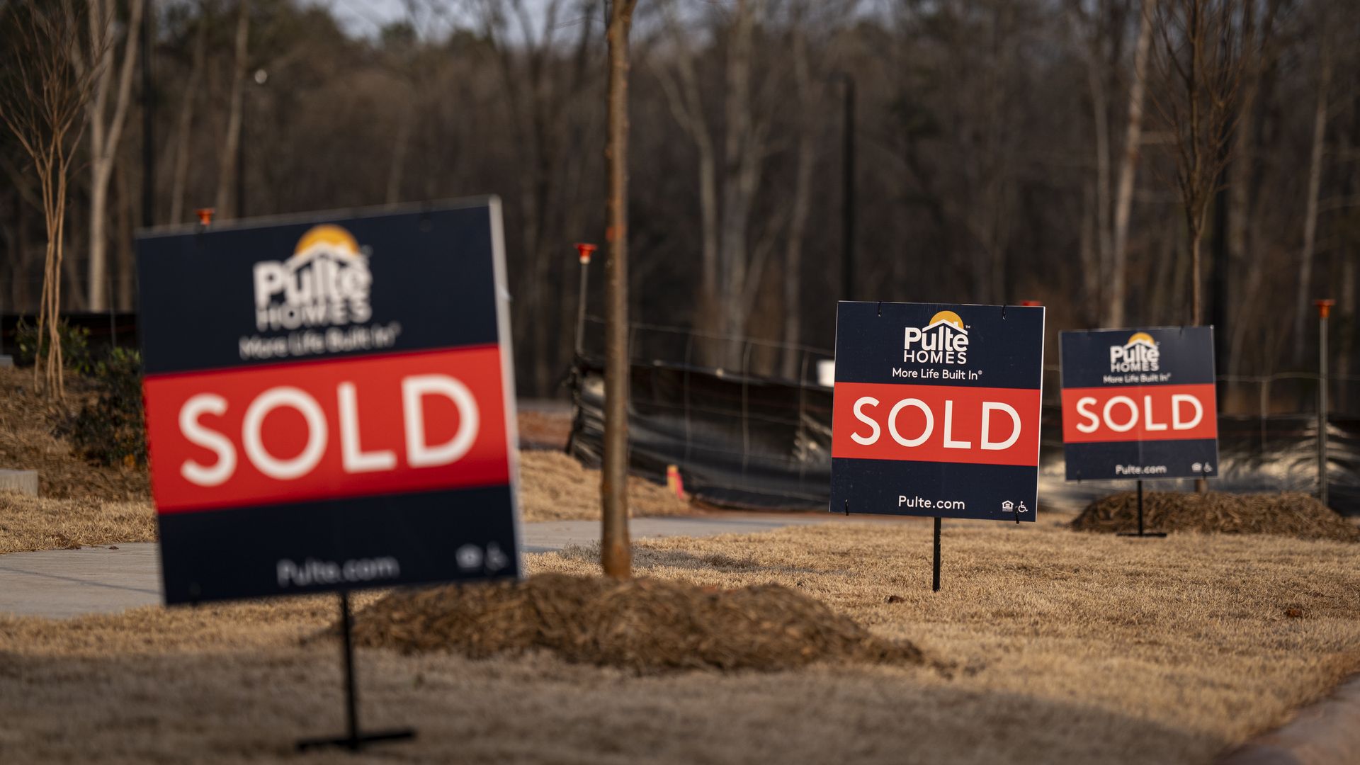 DURHAM, NC - MARCH 3: Sold signs outside of new Pulte homes, constructed by PulteGroup Inc., on March 3, 2026 in Durham, North Carolina. About 64.5% of households in North Carolina own their home, with the median home price listed at $370,000 in 2025. (Photo by Al Drago/Getty Images)