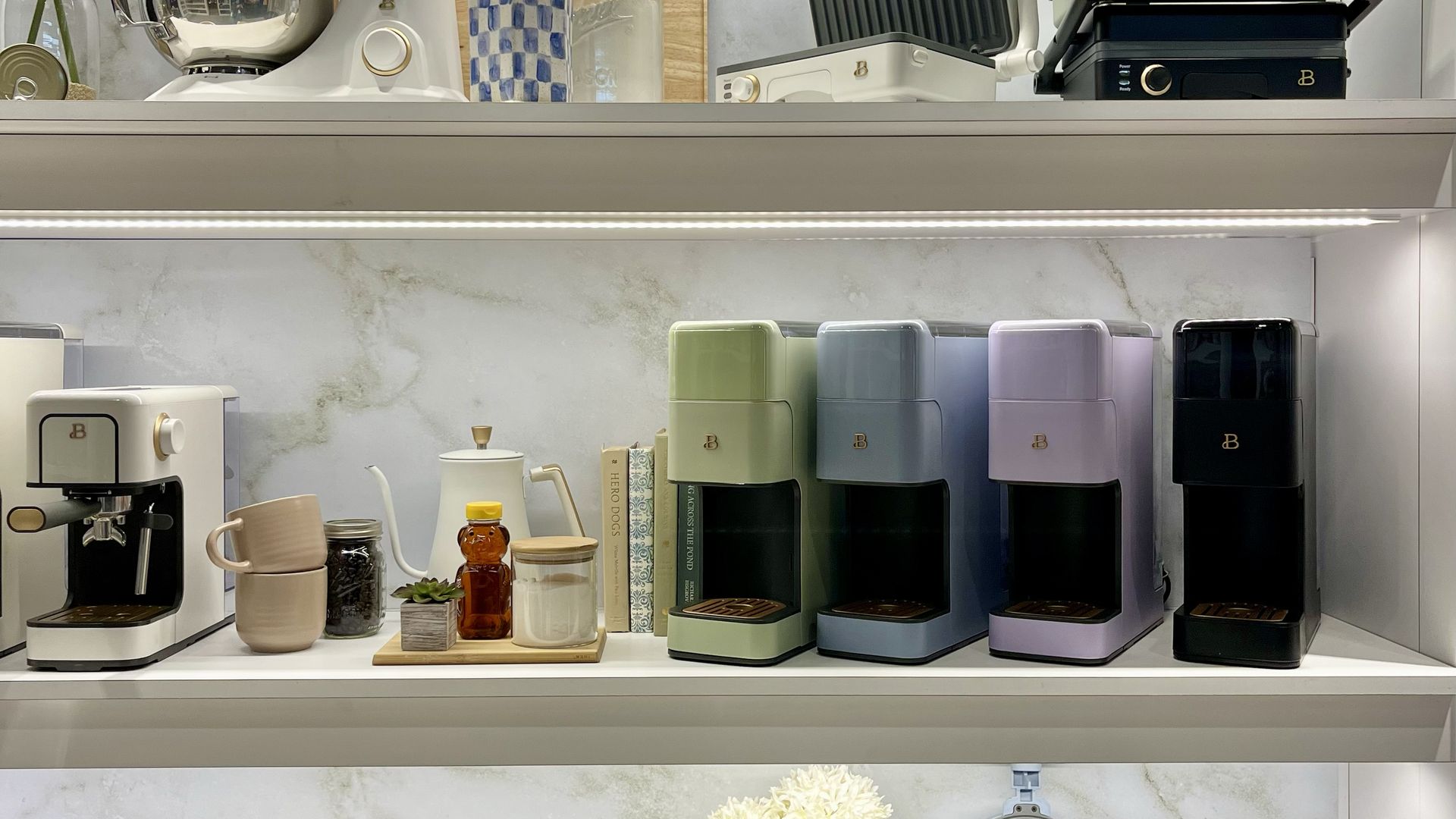 colorful coffee machines and kitchen counter appliances