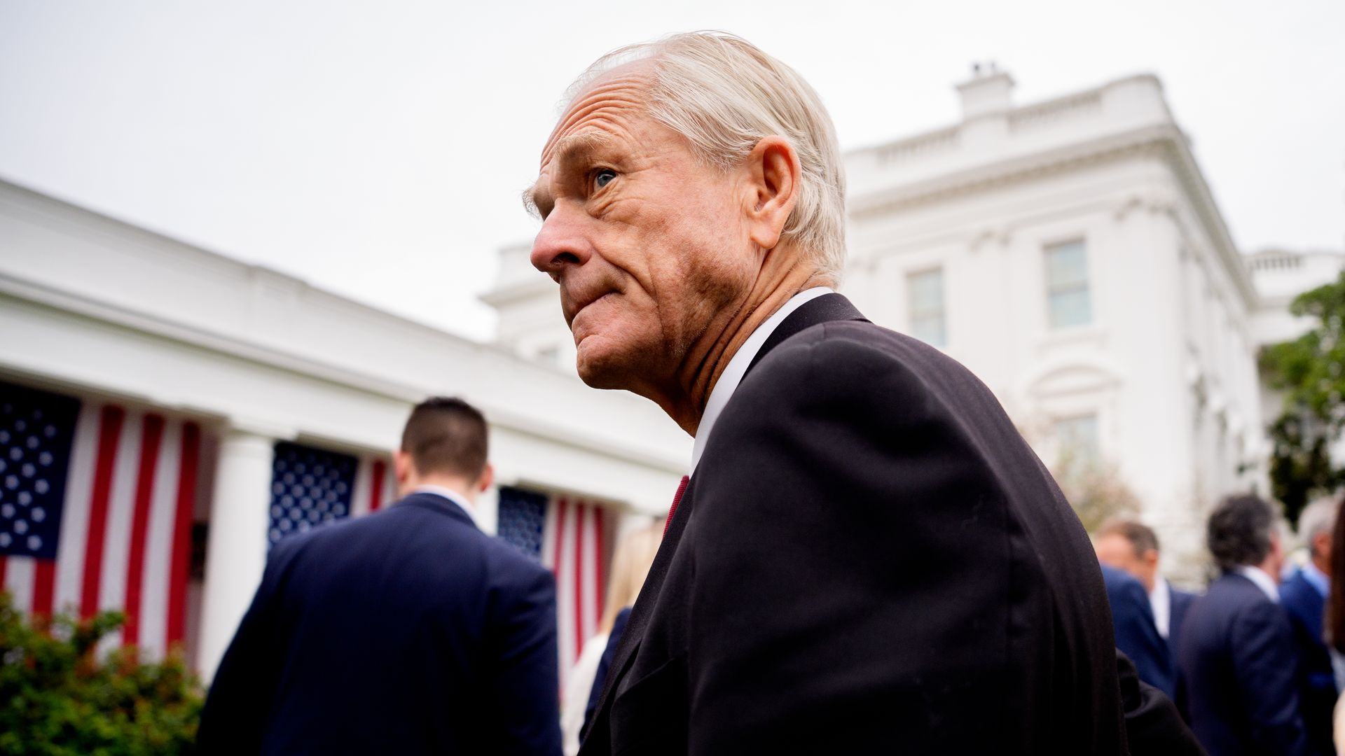 Peter Navarro looks on during an event outside the White House.