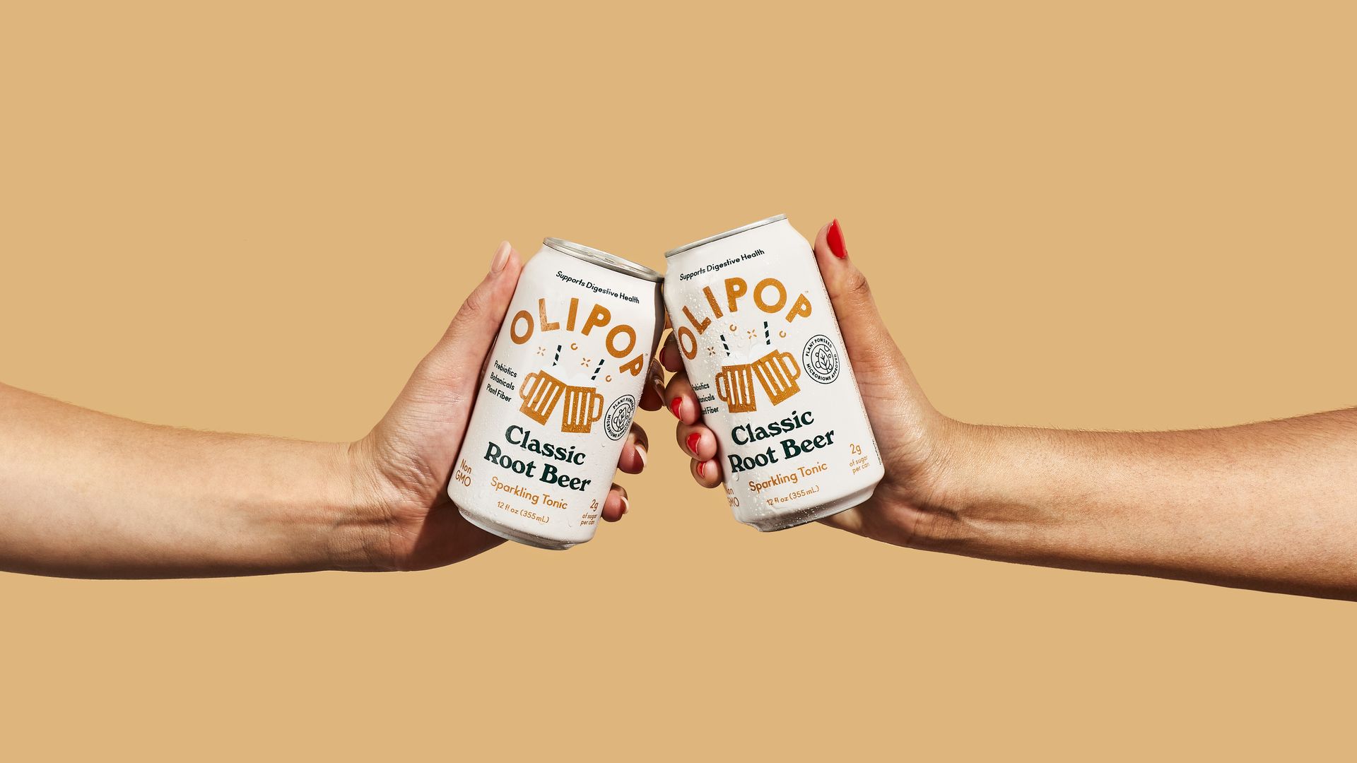 Two cans of Olipop touch, toasting the company's revenue growth.