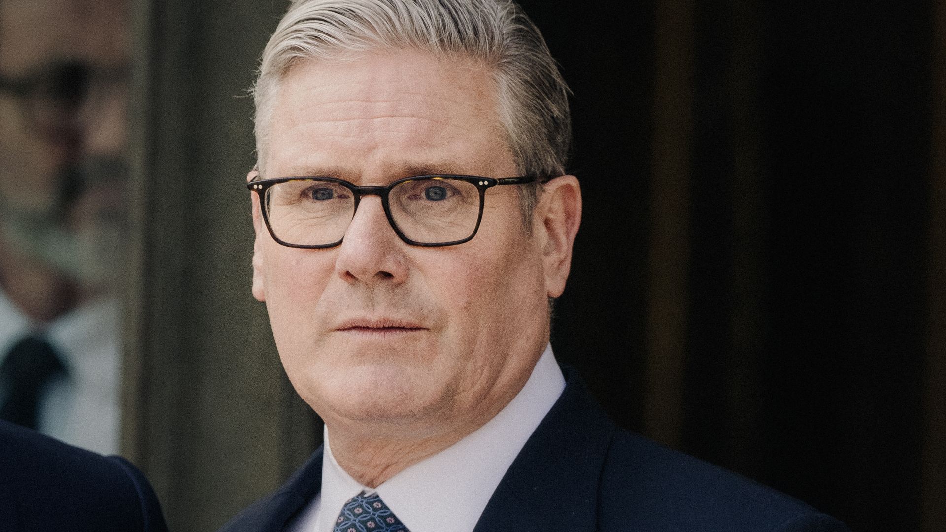 Close up portrait of Keir Starmer Prime Minister of the United Kingdom upon his arrival to co chair a meeting of allies to consider sending a multinational force to ensure security and the free flow of trade in the Strait of Hormuz at the Elysee Presidential Palace in Paris France on April 17, 2026.