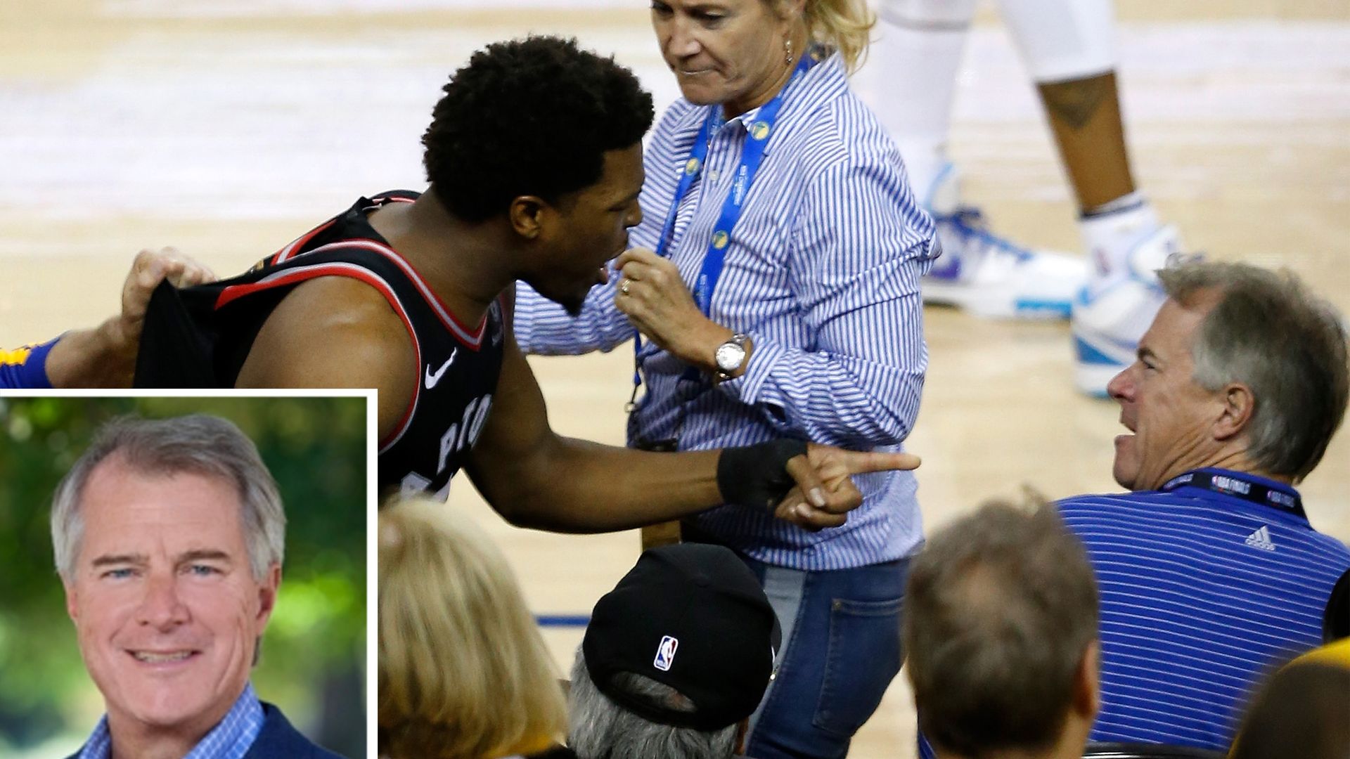 Kyle Lowry pointing at Mark Stevens during an NBA Finals game.