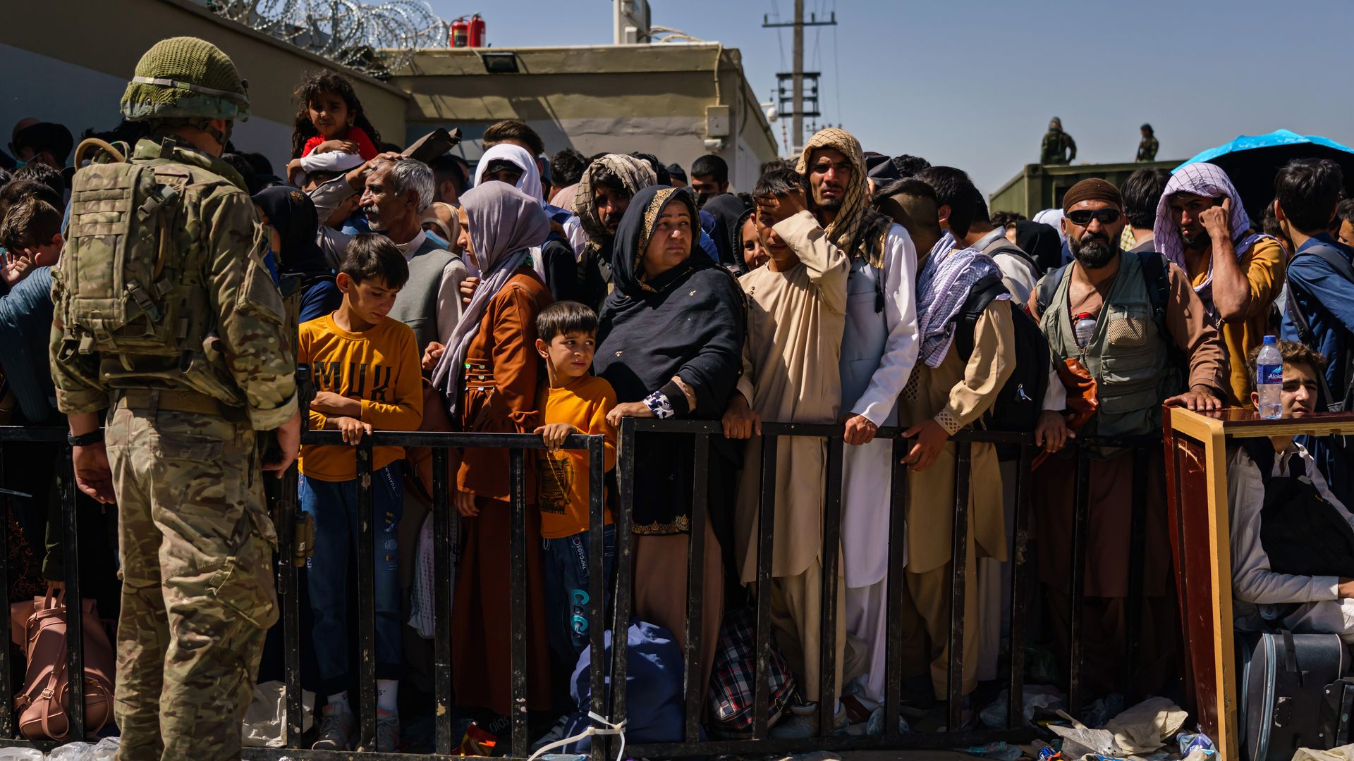 At the intake Abbey Gate, British and American security forces maintain order amongst the Afghan evacuees waiting to leave, in Kabul, Afghanistan