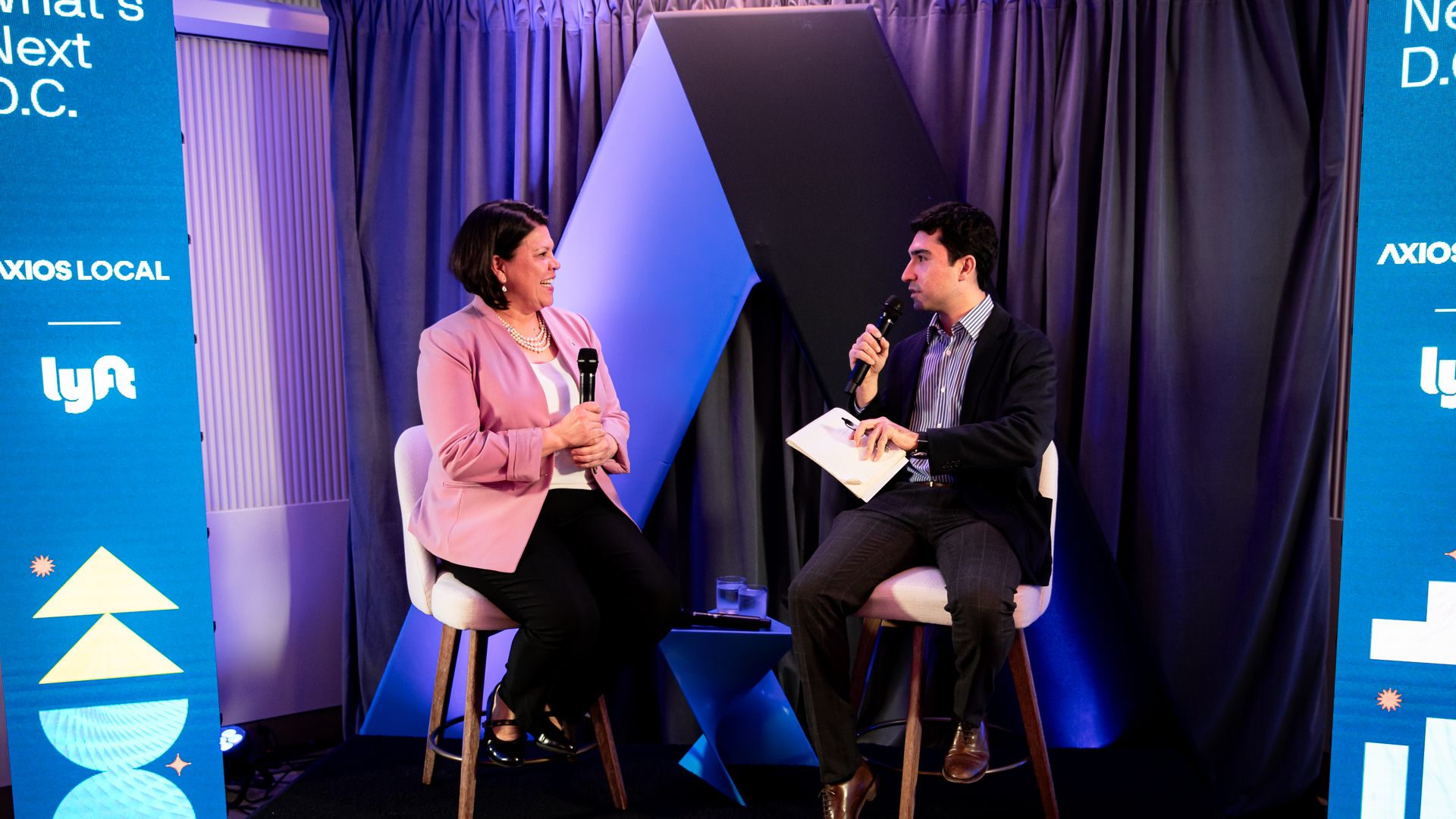 Deputy mayor Nina Albert is interviewed by Axios reporter Cuneyt Dil