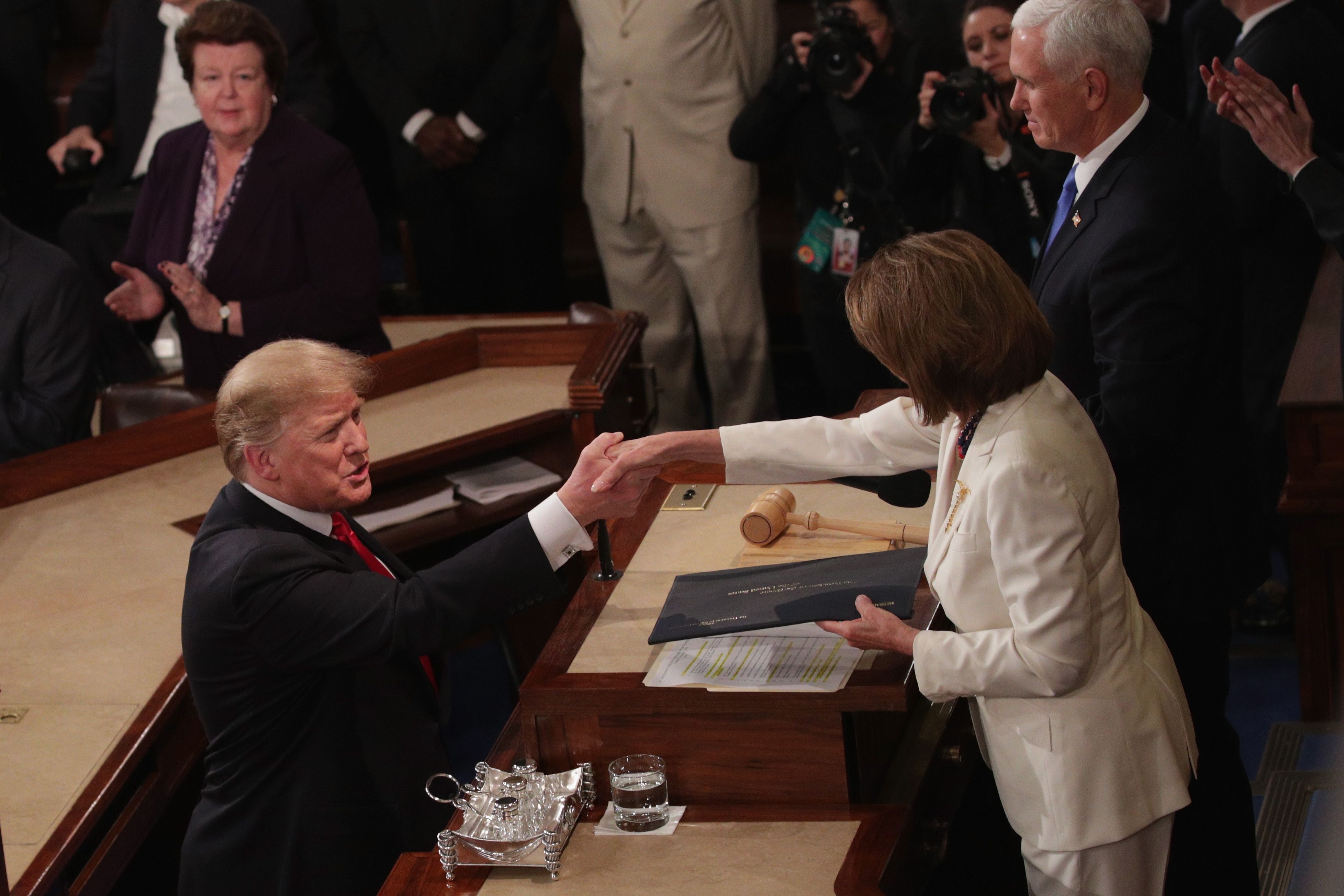 Trump shakes hands with Speaker Nancy Pelosi