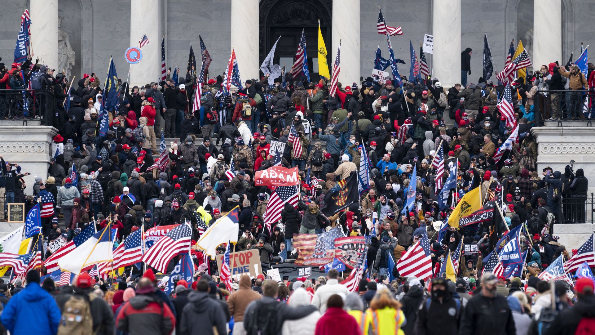Trump supporters take over the steps of the Capitol on Wednesday, Jan. 6, 2021.