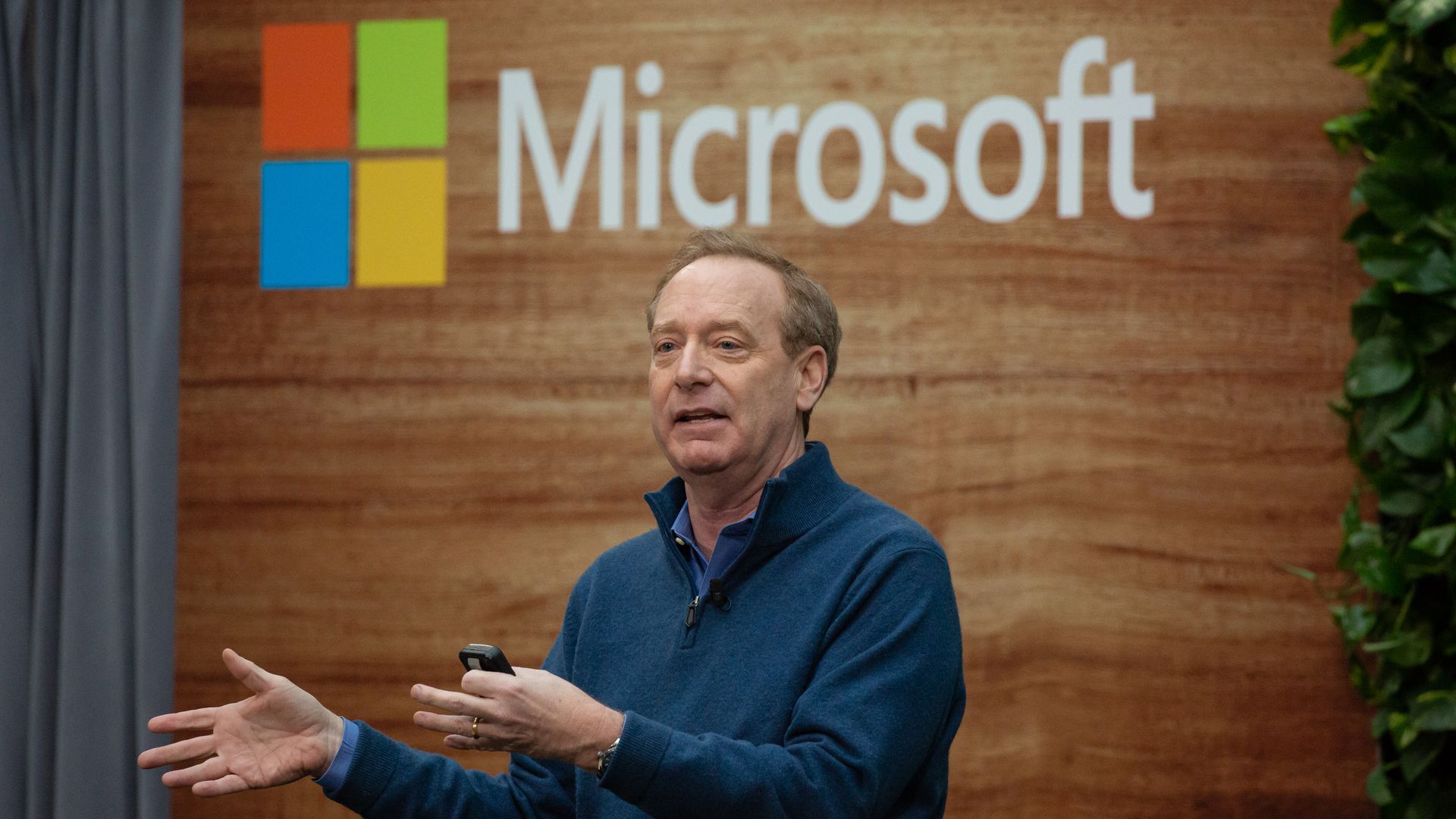 Microsoft President Brad Smith speaks at an event