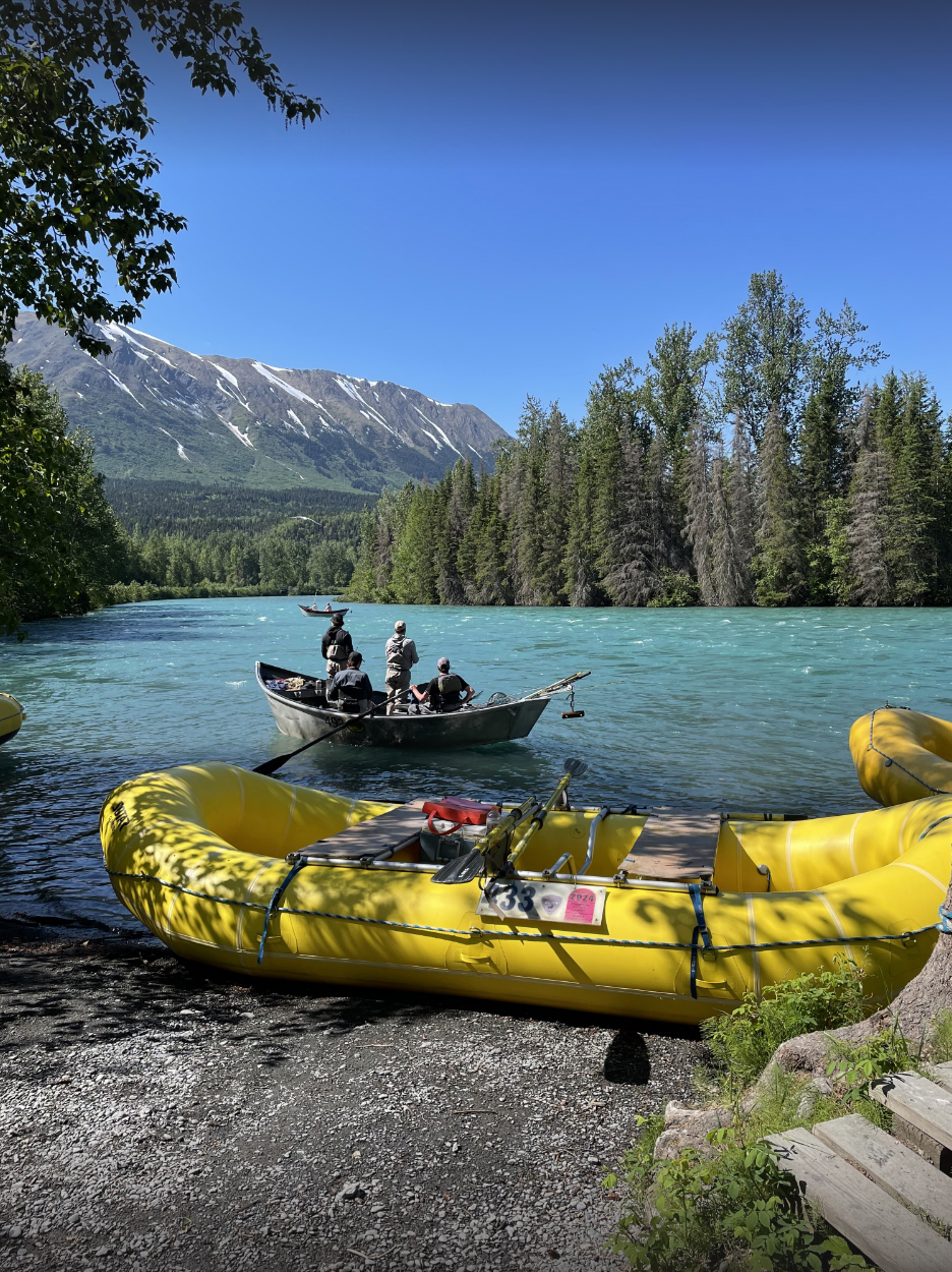Boat on water amid mountains