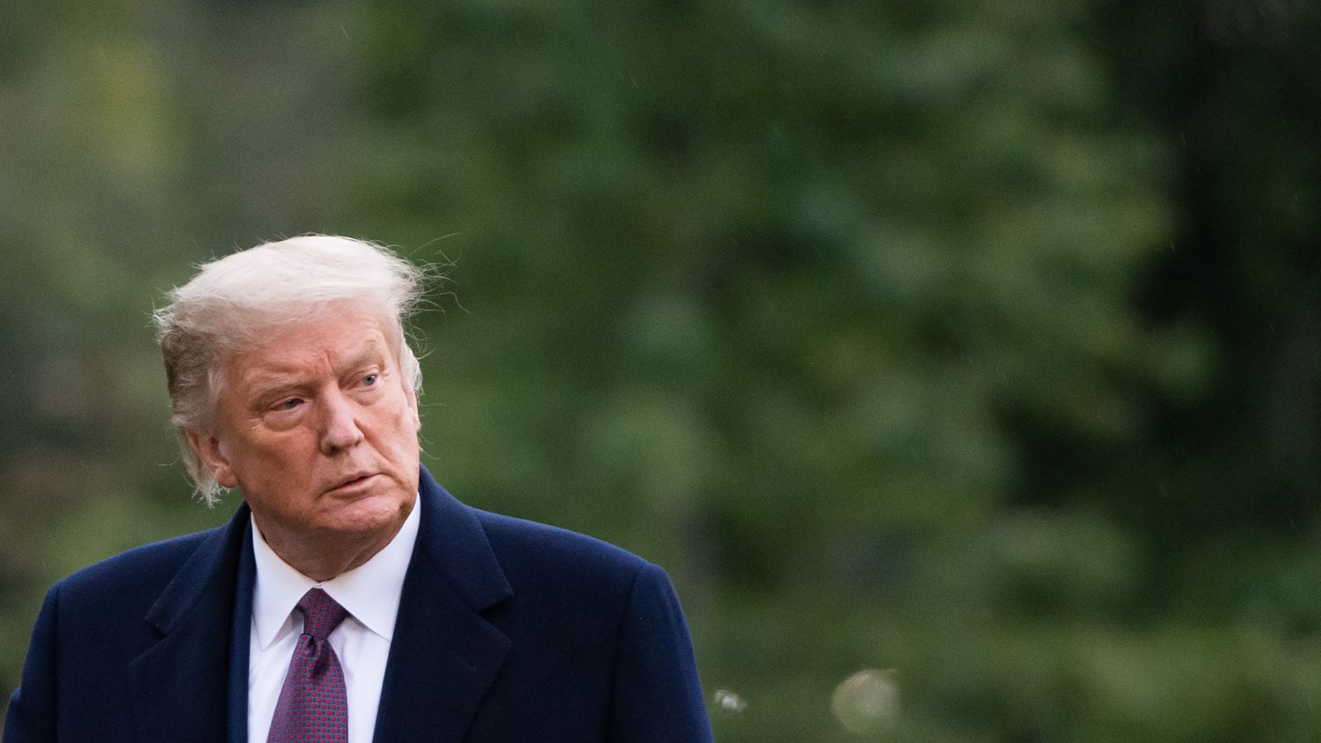 Trump wearing a suit and tie 