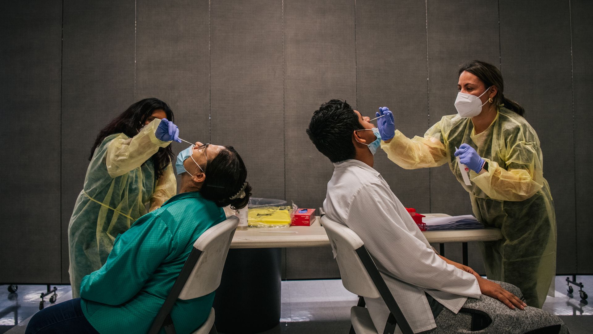 Medical assistants administer COVID-19 sampling tests