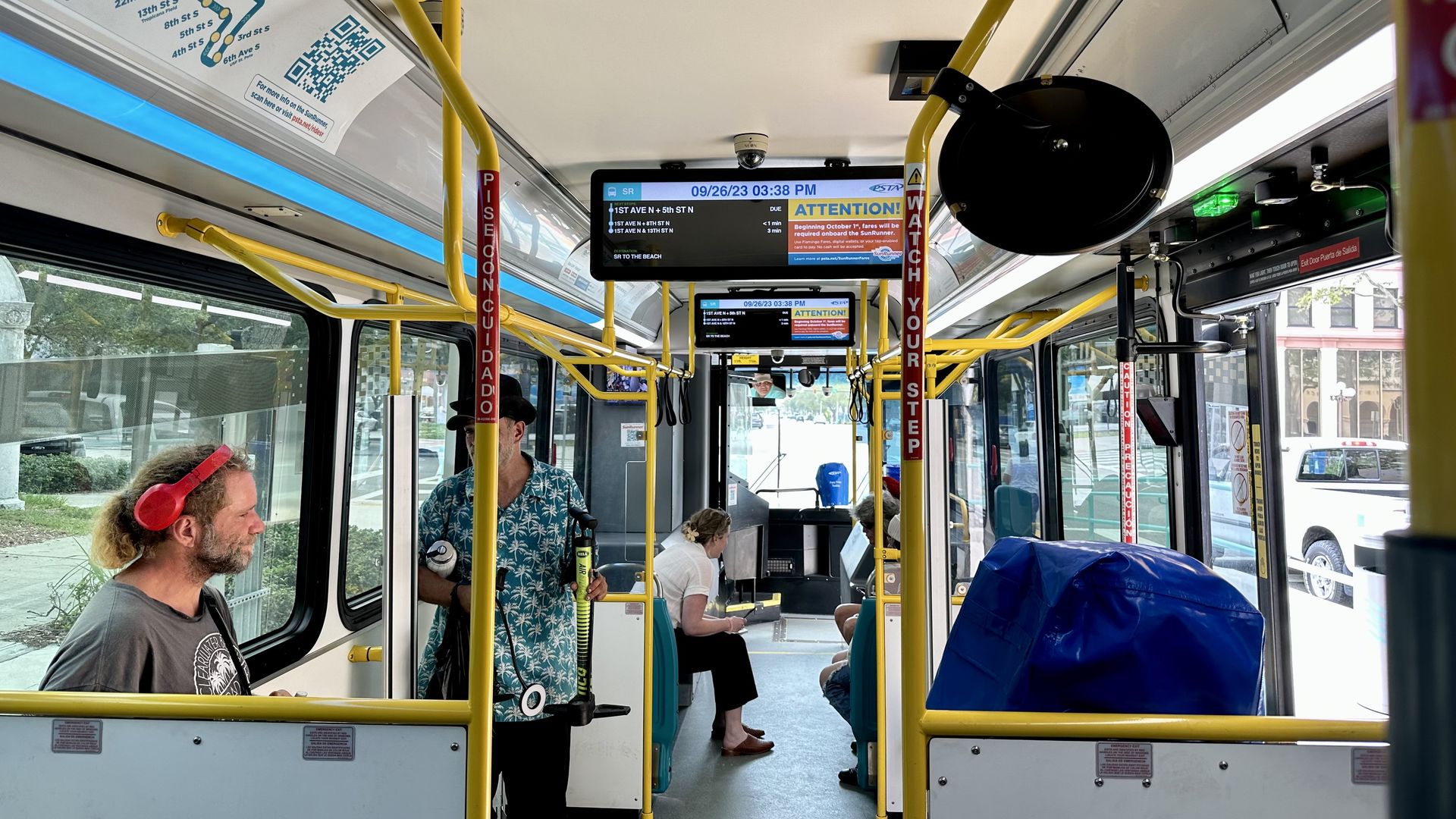 Insdie the SunRunner a screen showing the next stop shows an advisory for upcoming fares