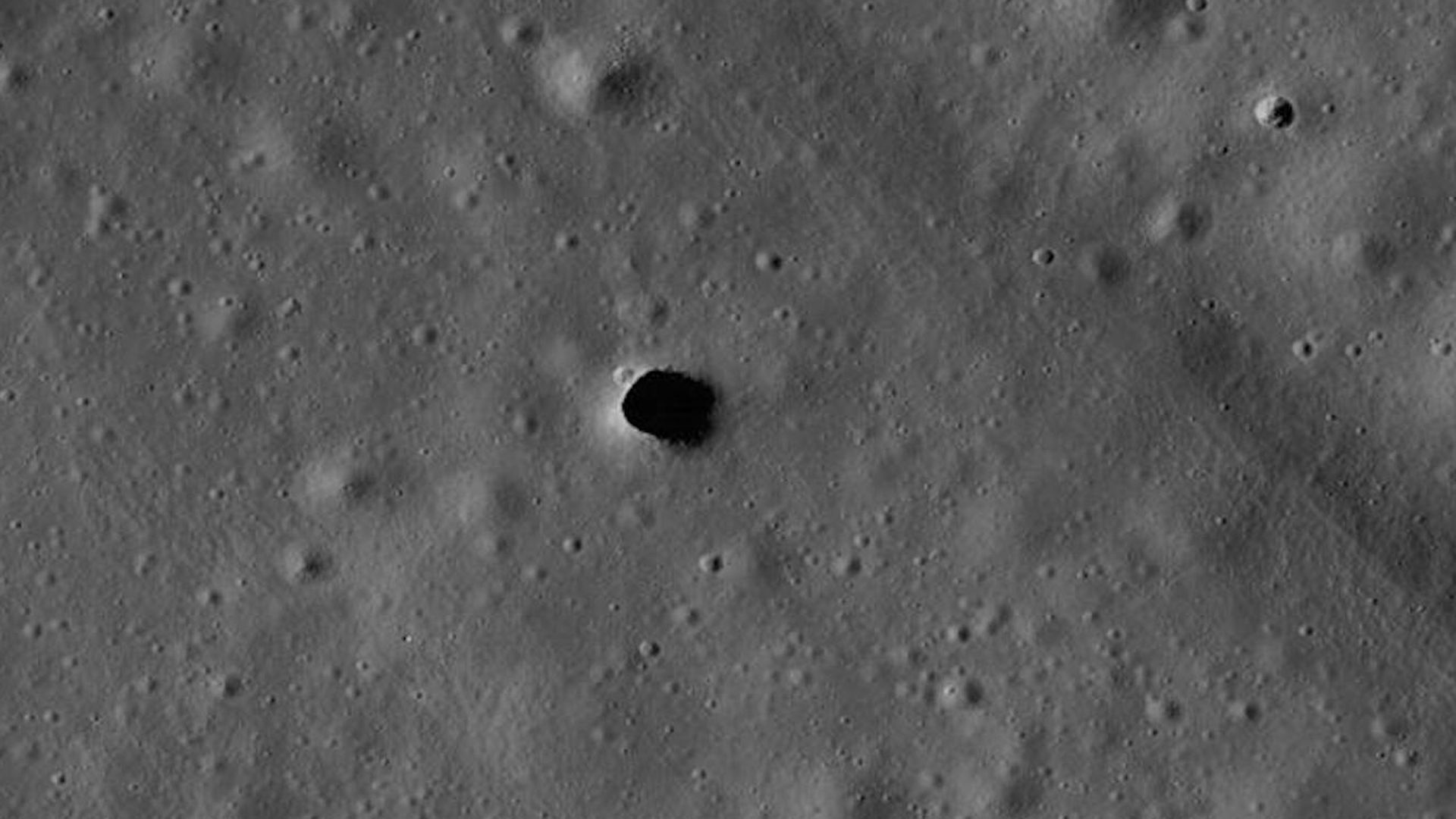 The Marius Hills pit is a possible skylight in a lava tube in an ancient volcanic region of the Moon called the Marius Hills.