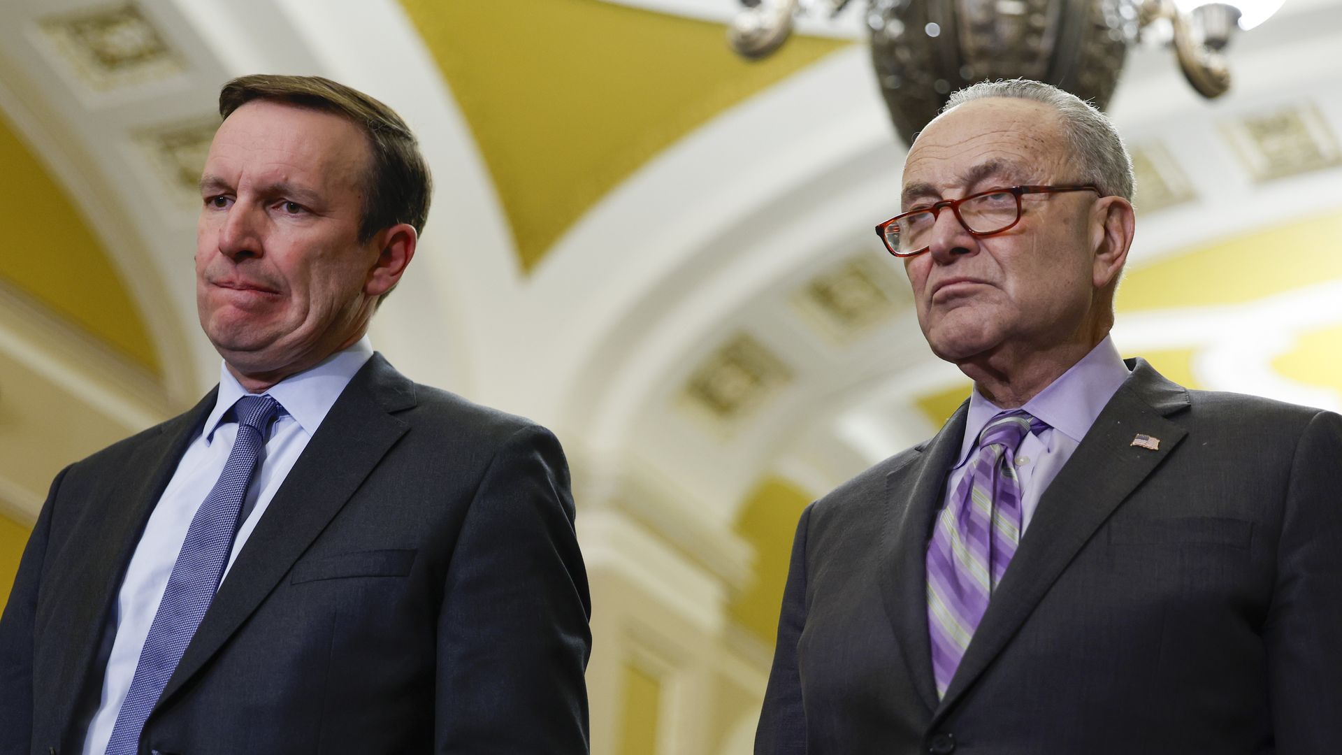 Chris Murphy (D-CT) and Senate Majority Leader Chuck Schumer (D-NY) listen at a news conference after a weekly policy luncheon with Senate Democrats at the U.S. Capitol Building 